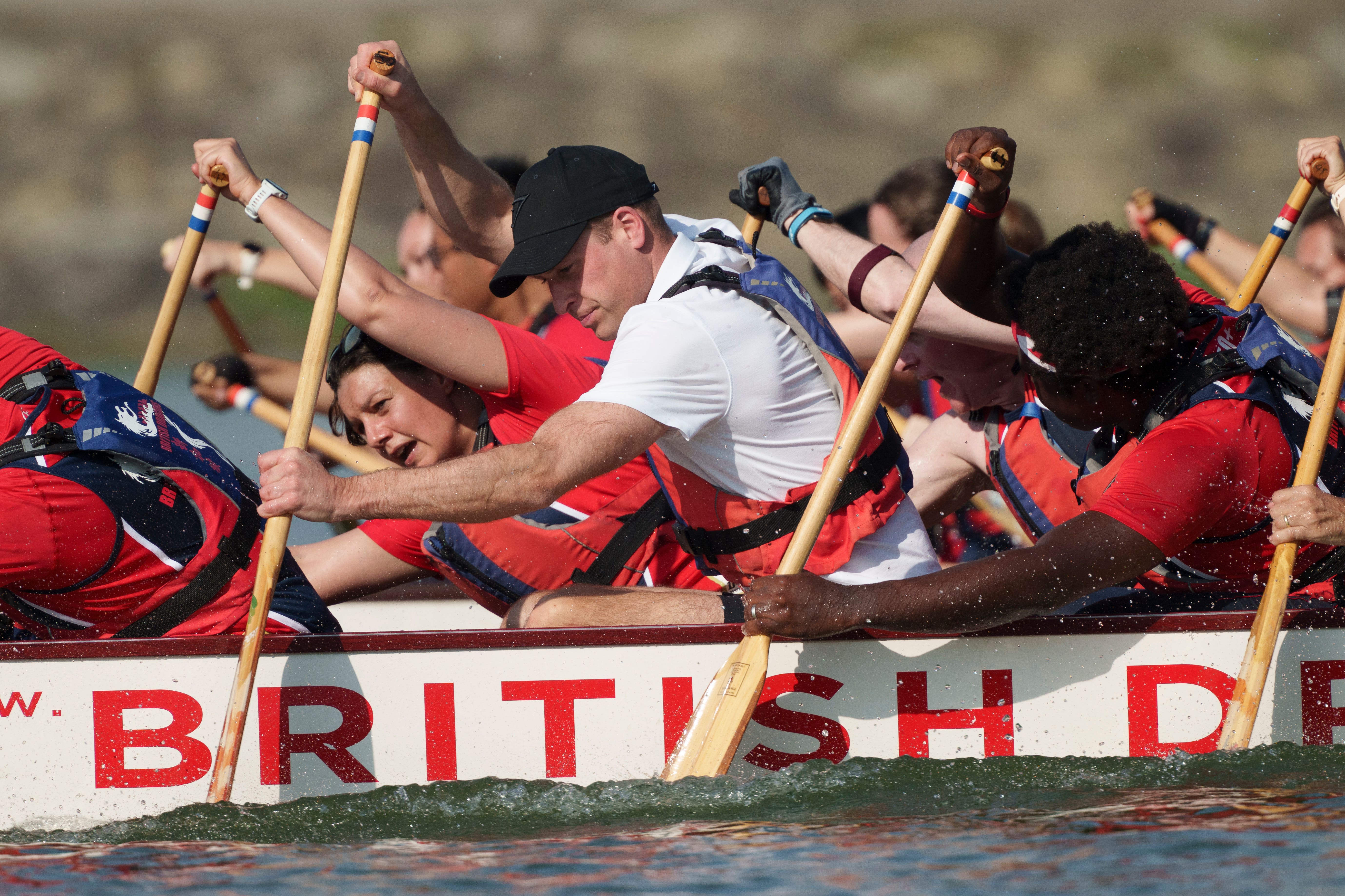 The Prince of Wales participates in a dragon boat event in Singapore (Vincent Thian/AP)