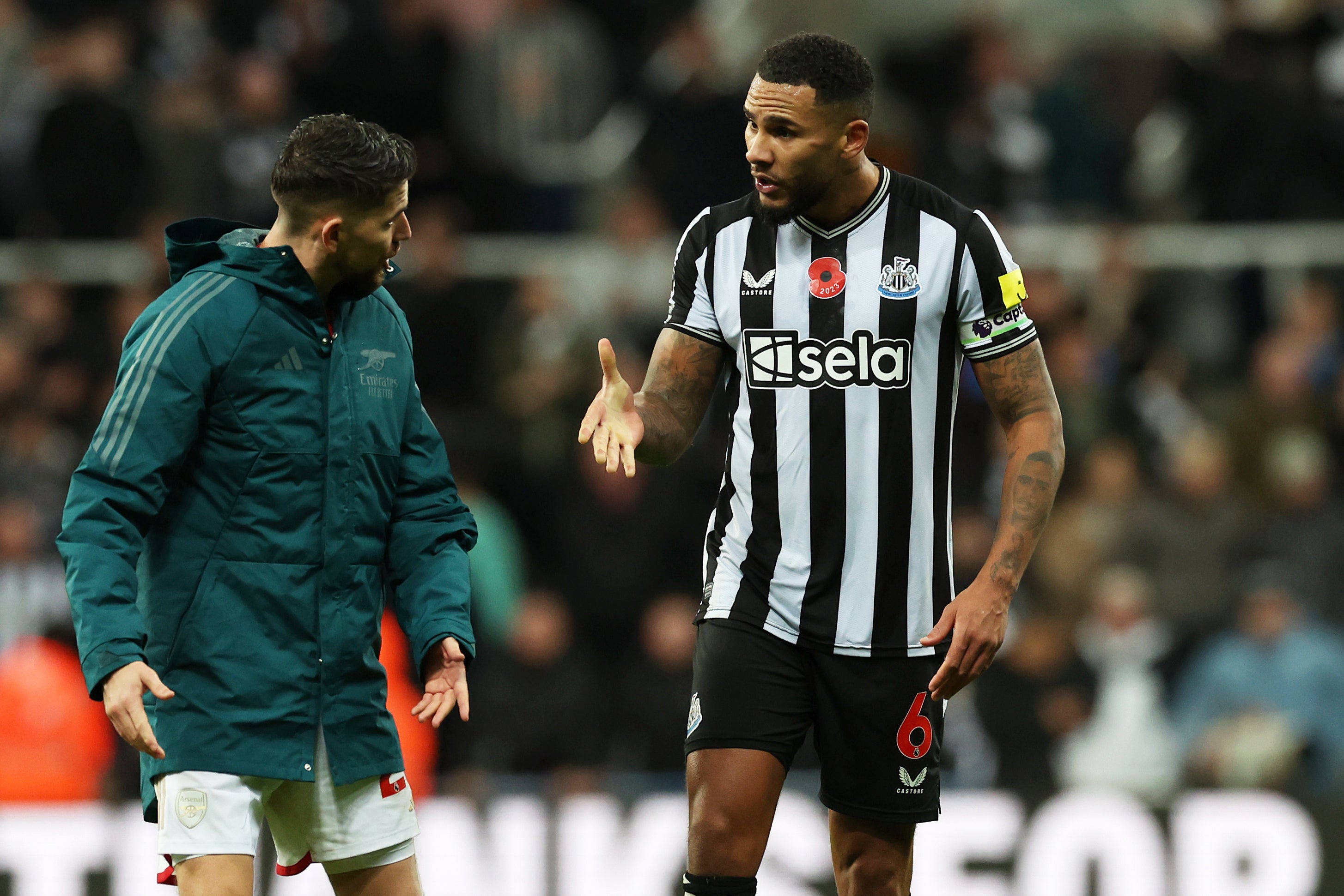 Jamaal Lascelles (right) was refused a handshake by Jorginho