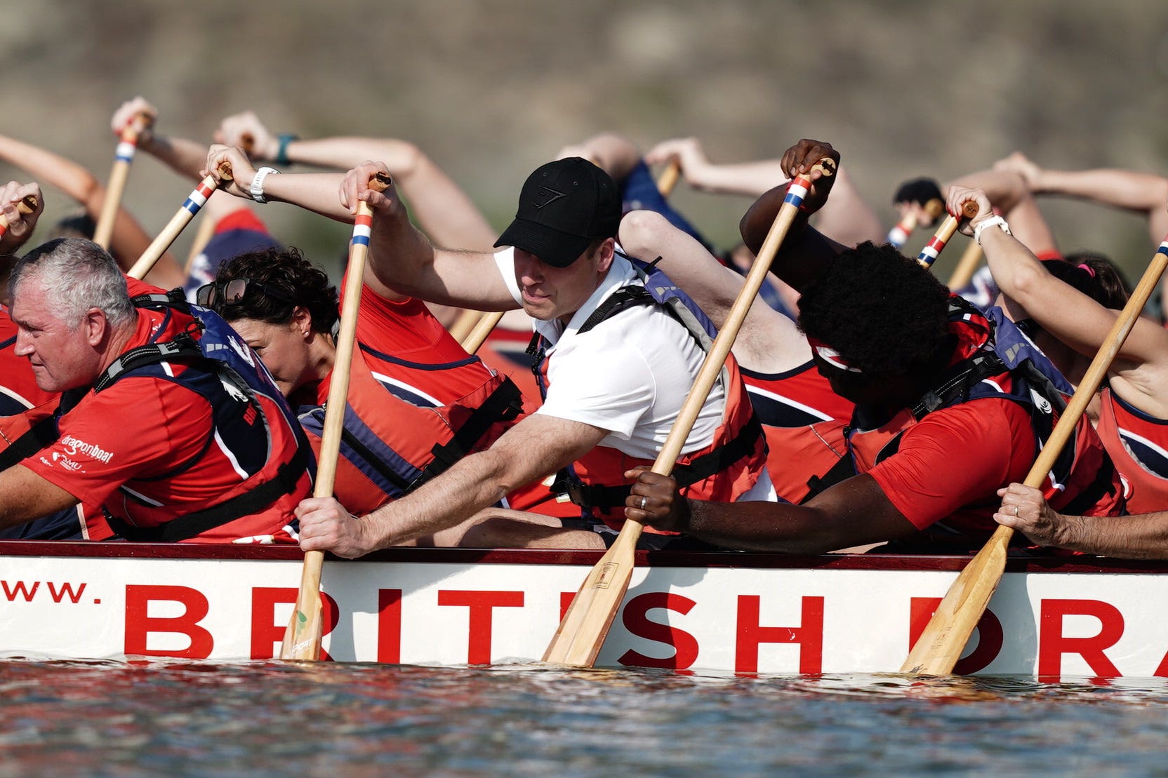 The Prince of Wales participates in a dragon boat event in Singapore (Jordan Pettitt/PA)