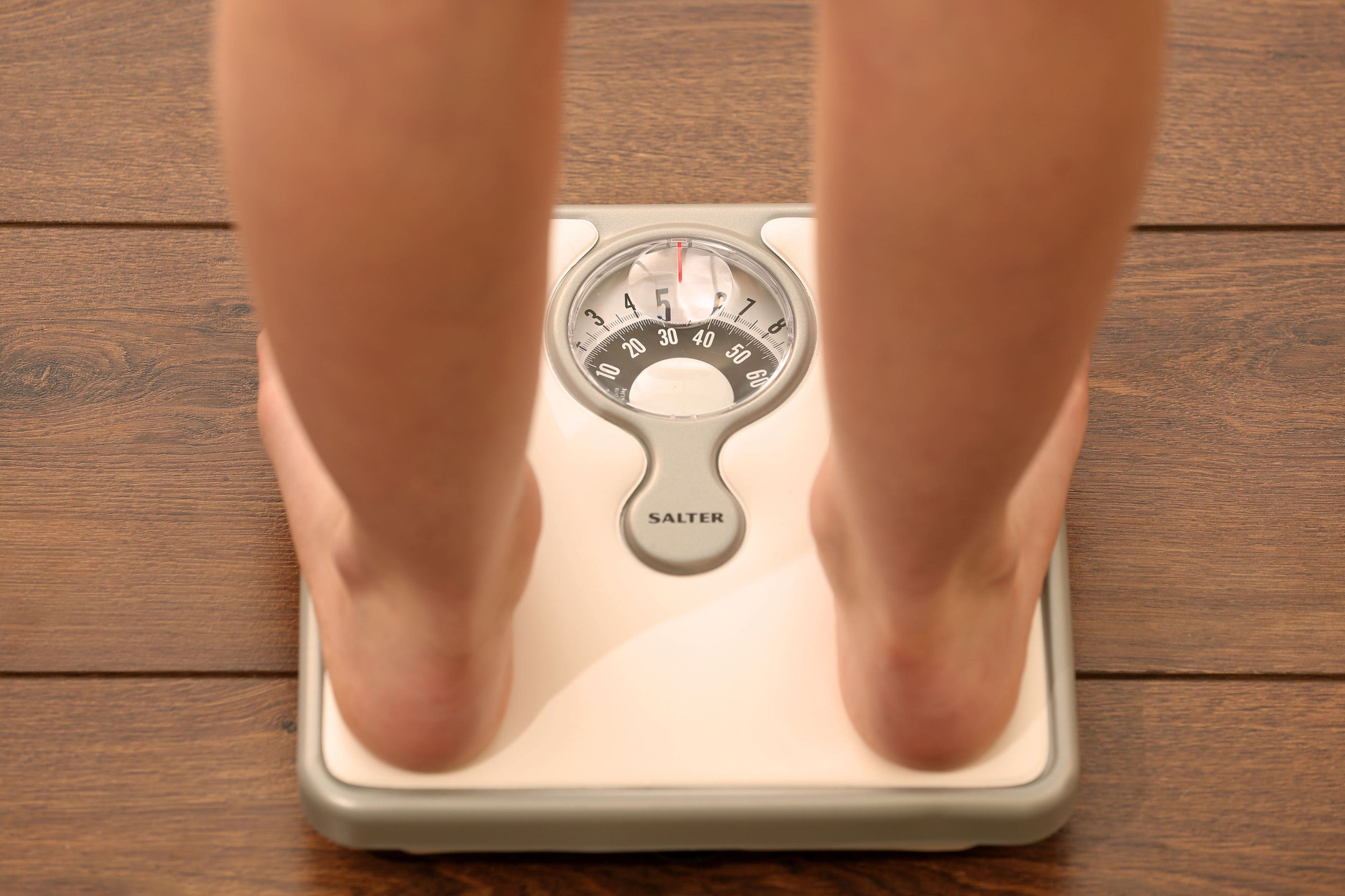 People were less likely to lose weight if doctors emphasised the negative consequences of obesity or used neutral language, researchers said (Chris Radburn/PA)