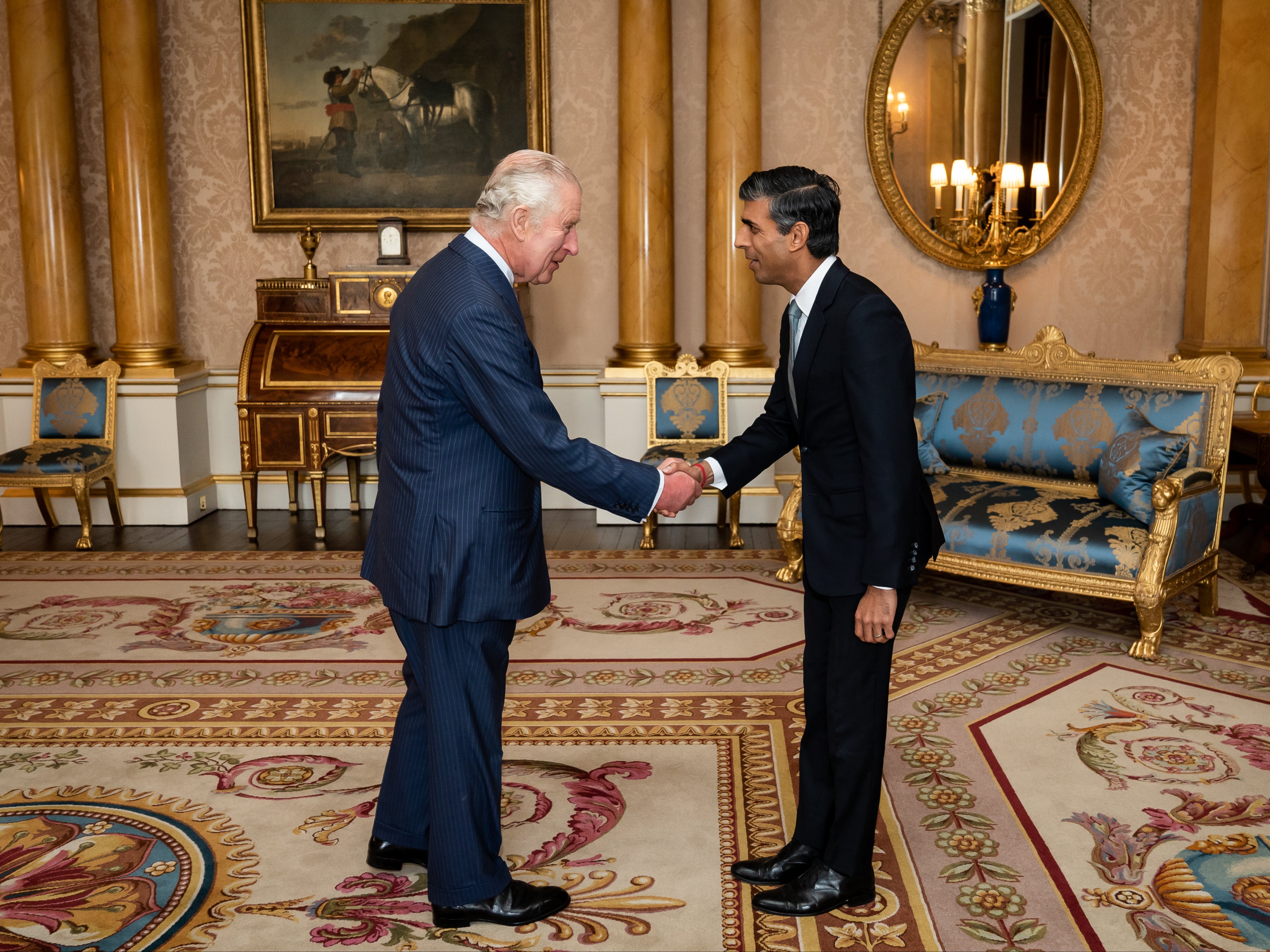 King Charles welcoming Rishi Sunak during an audience at Buckingham Palace