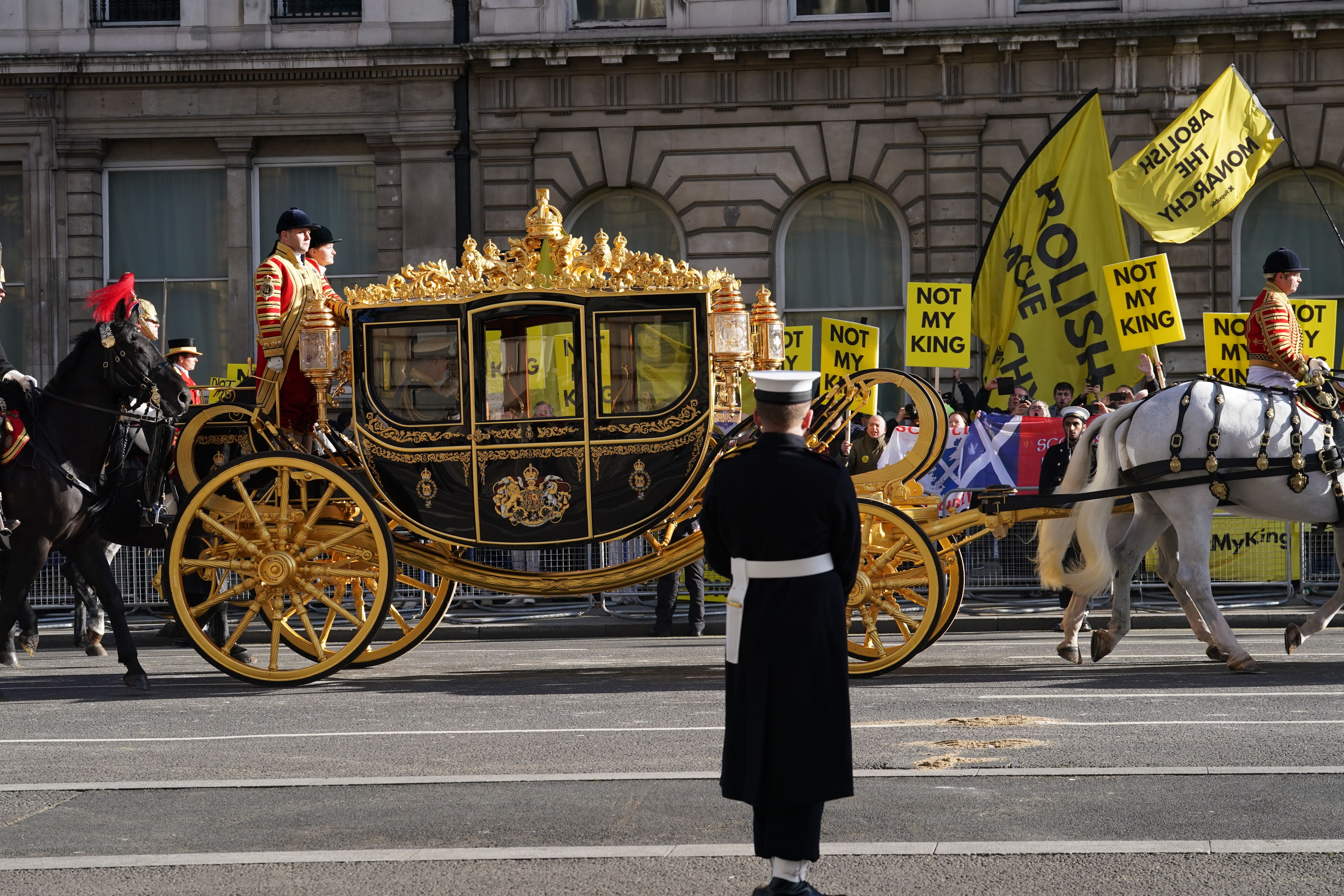 Anti-monarchy pressure group Republic protests outside the Palace of Westminster in London during the State Opening of Parliament in the House of Lords (Gareth Fuller/PA)