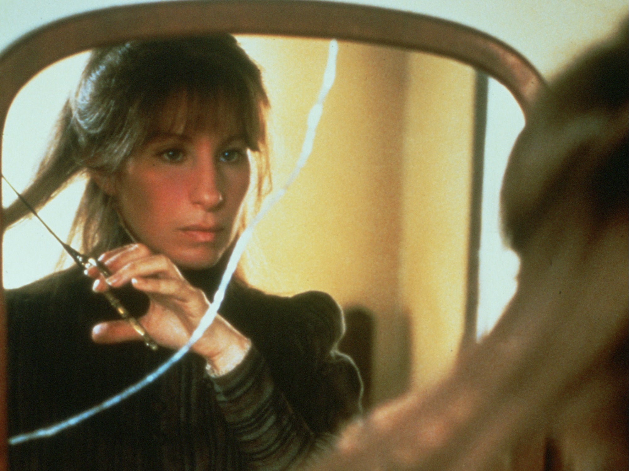 Streisand as the cross-dressing Yentl in her directorial debut film