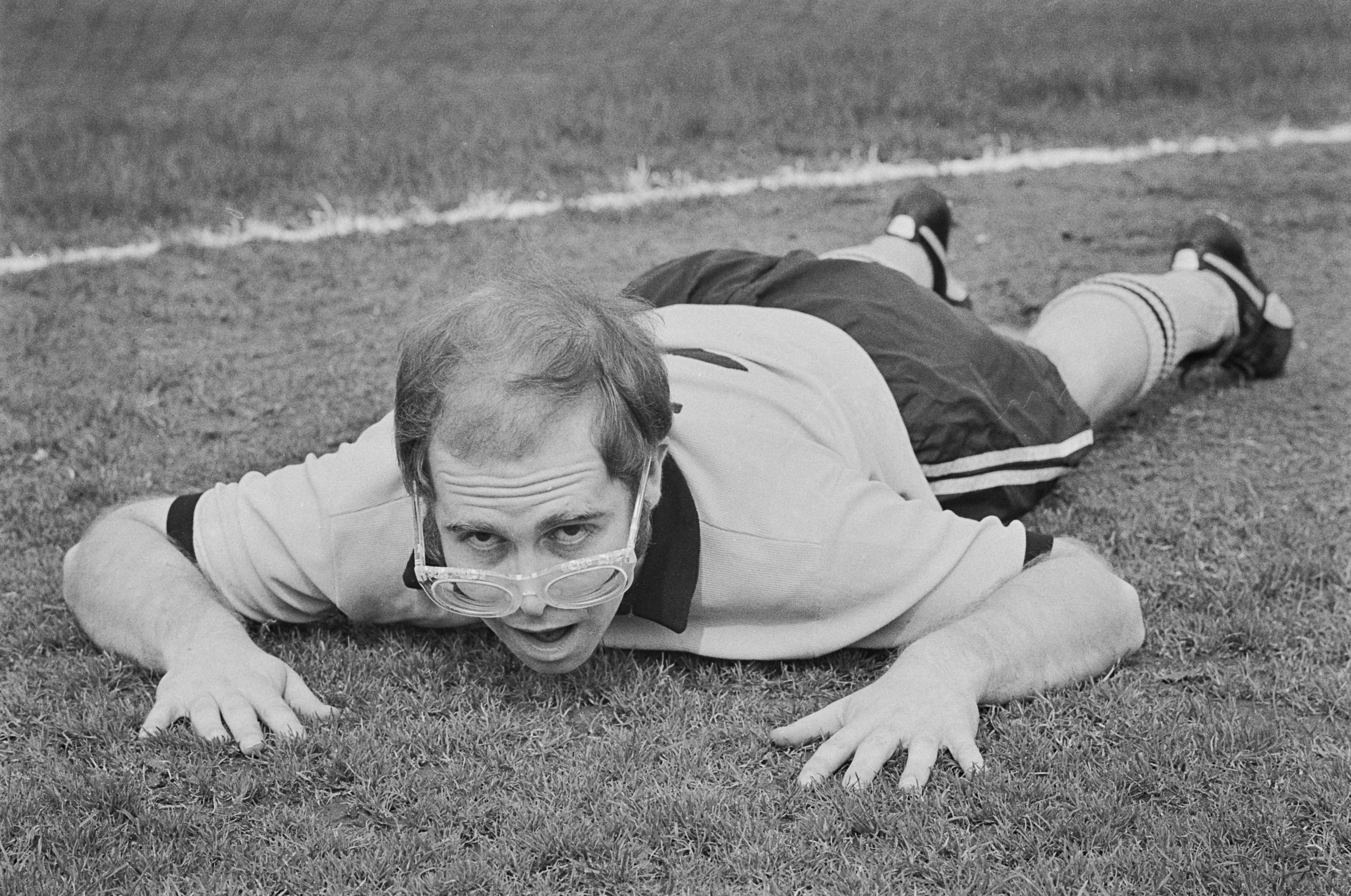 Elton John wearing a Watford football strip at Vicarage Road stadium in 1974