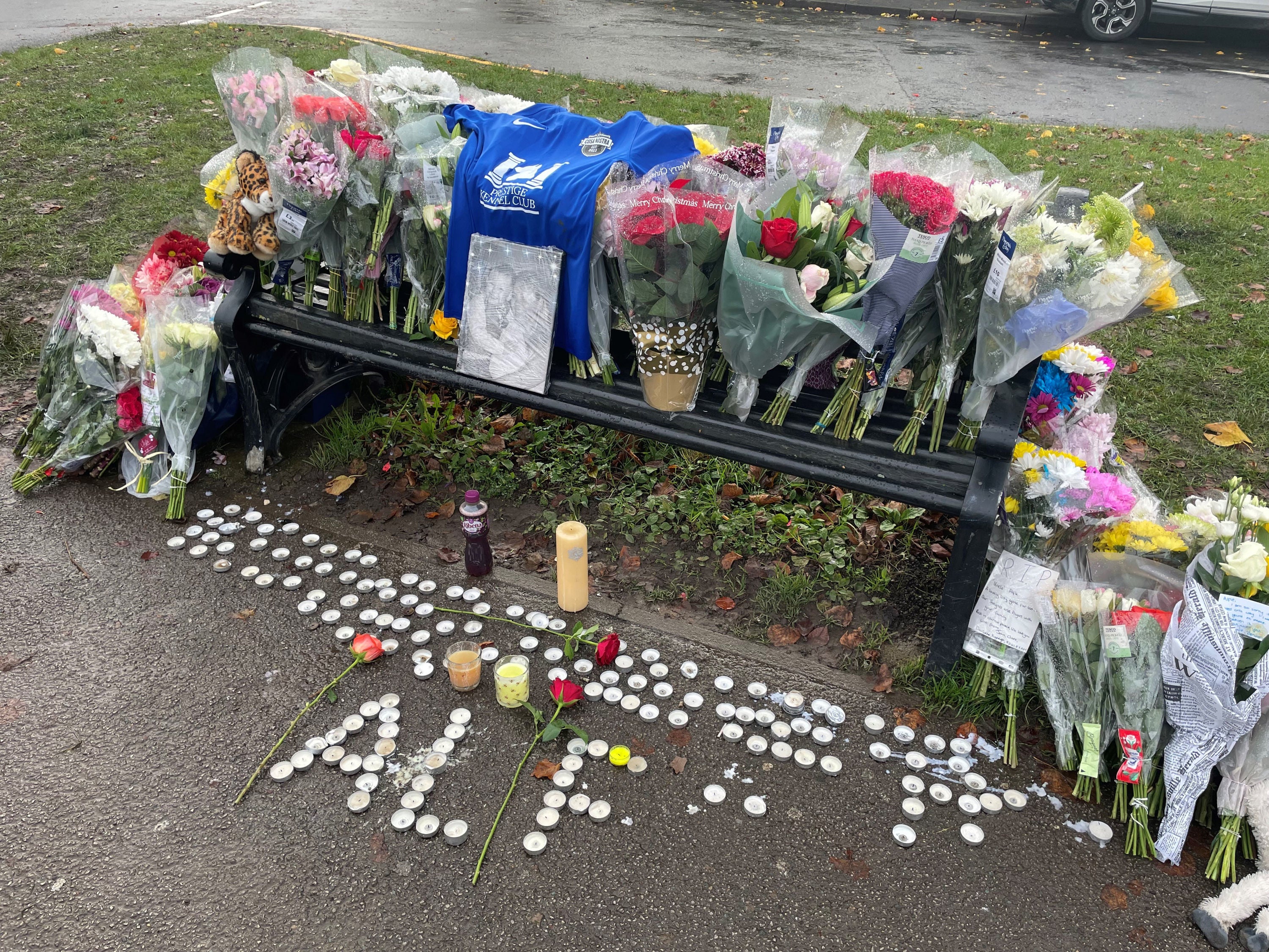 Tributes left on a bench on Broadgate Lane, Horsforth, following the death