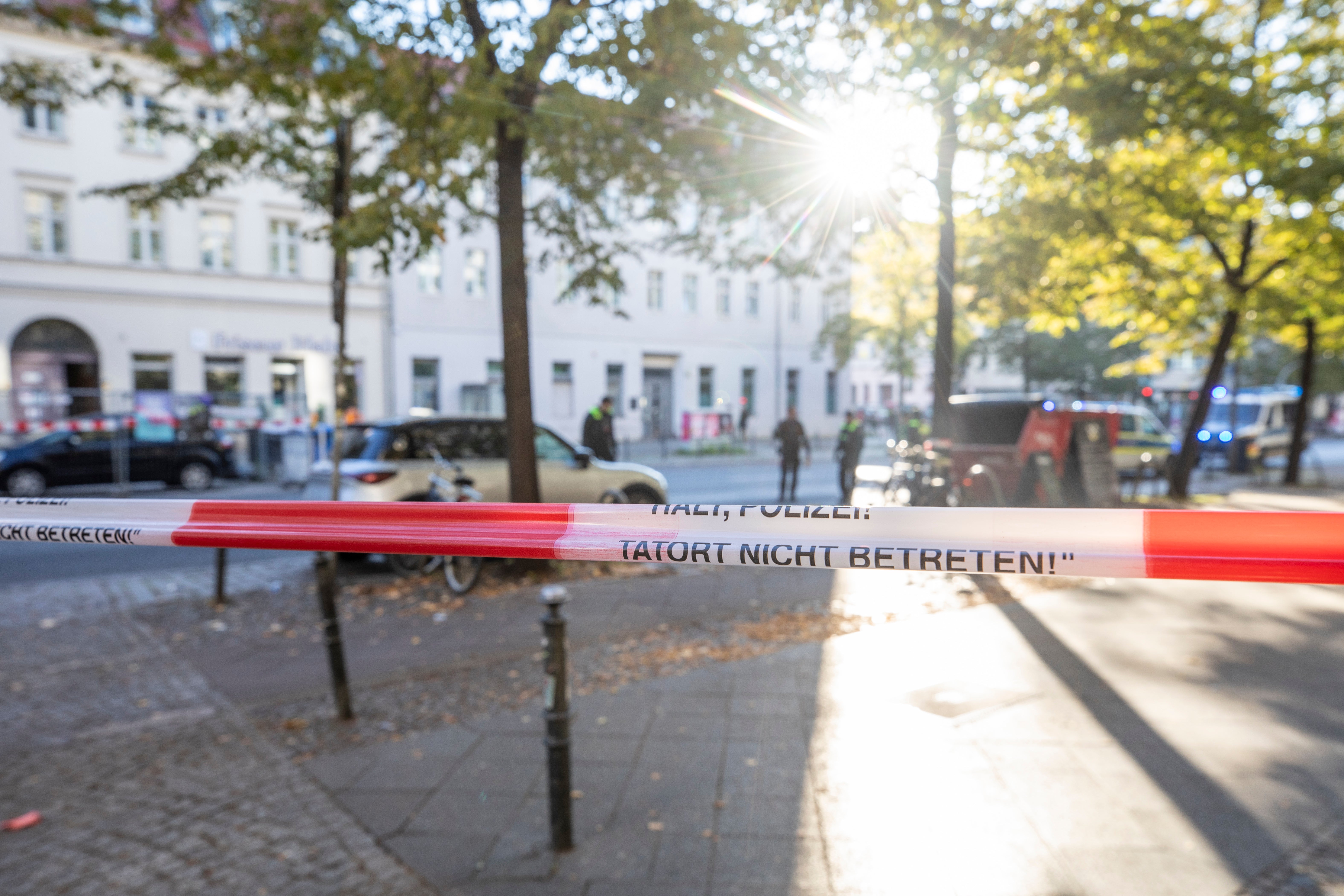 A police investigation near a building that houses a synagogue in Berlin following a pre-dawn attack on 18 October