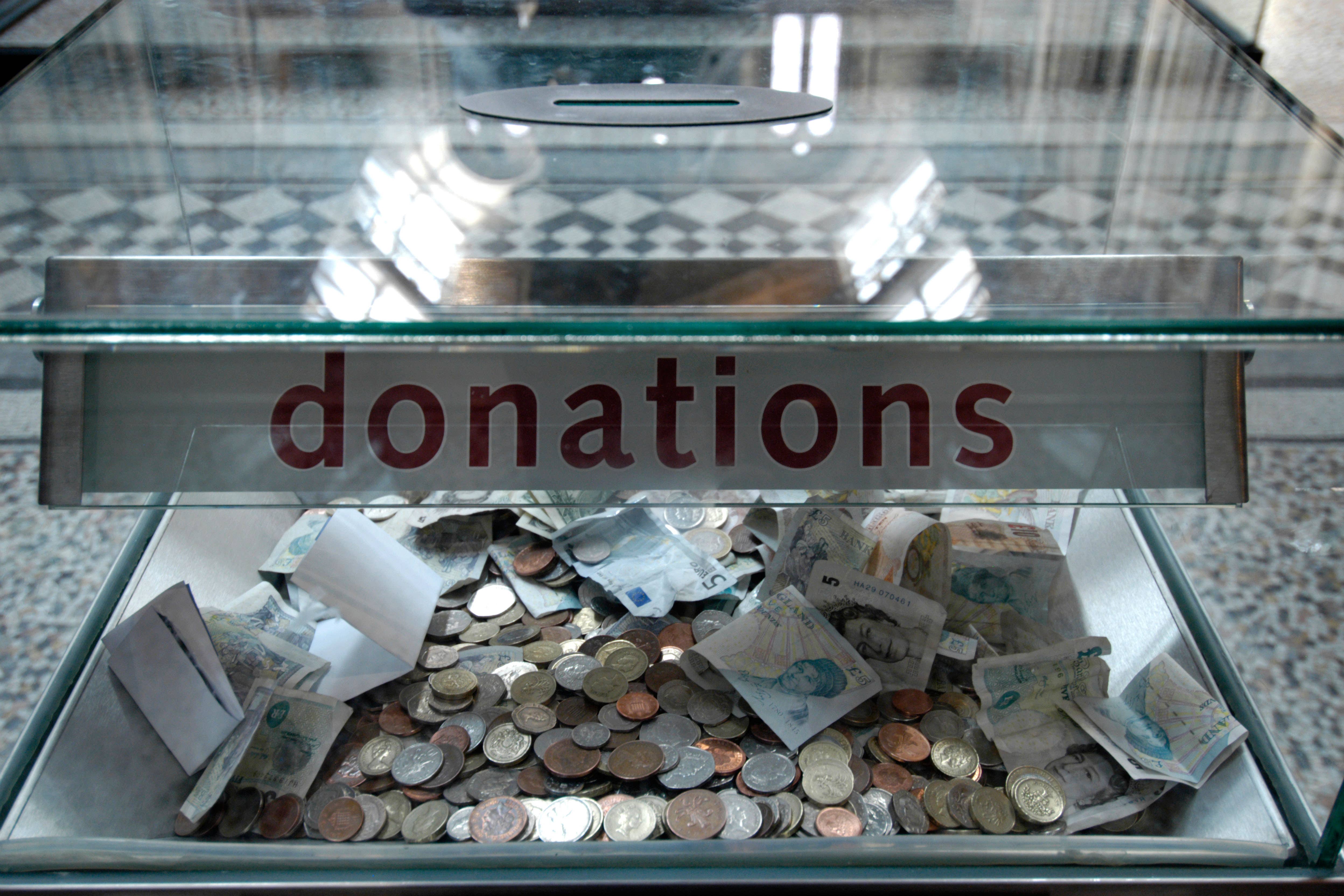 The UK is third for donating money to charity but ranks 17th in an overall global index (Alamy/PA)