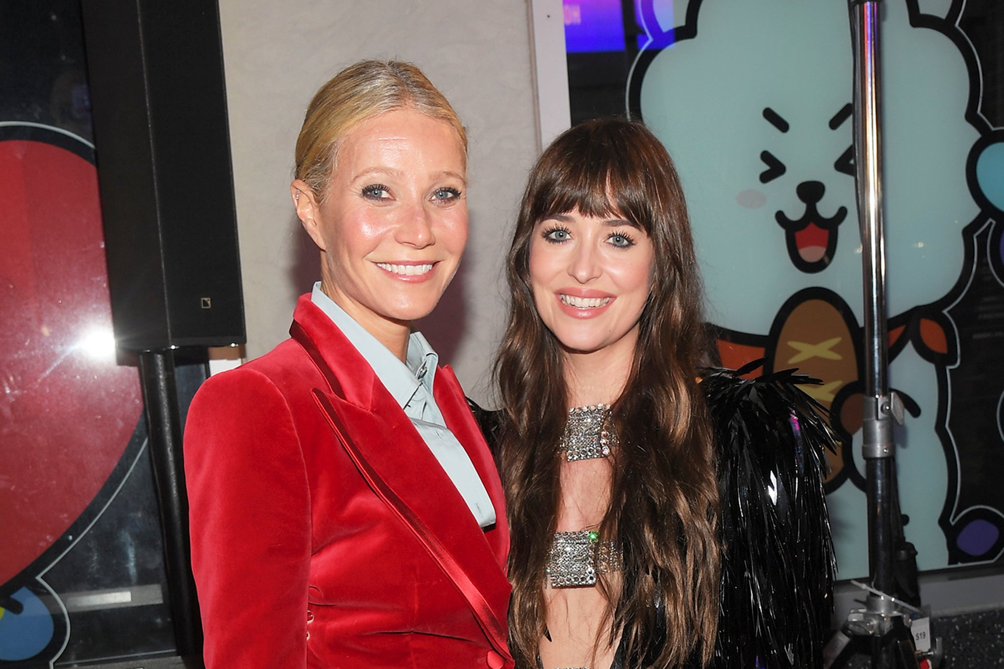 A person in common: Gwyneth Paltrow with her ex-husband Chris Martin’s new partner, Dakota Johnson