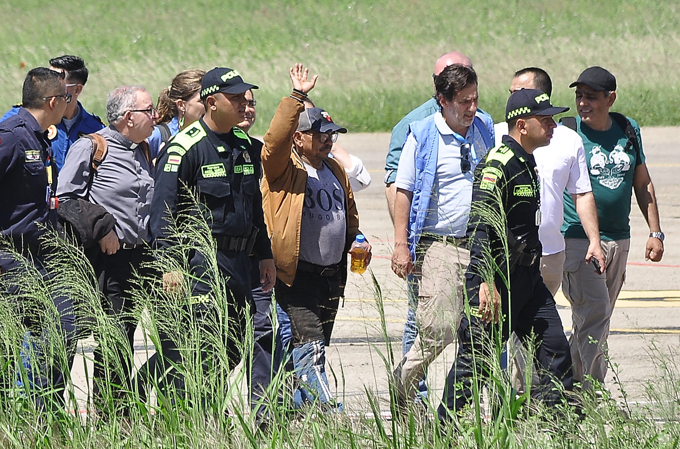 Luis Manuel Diaz, father of Liverpool’s forward Luis Diaz, waves after his release at the Alfonso Lopez airport in Valledupar, Colombia