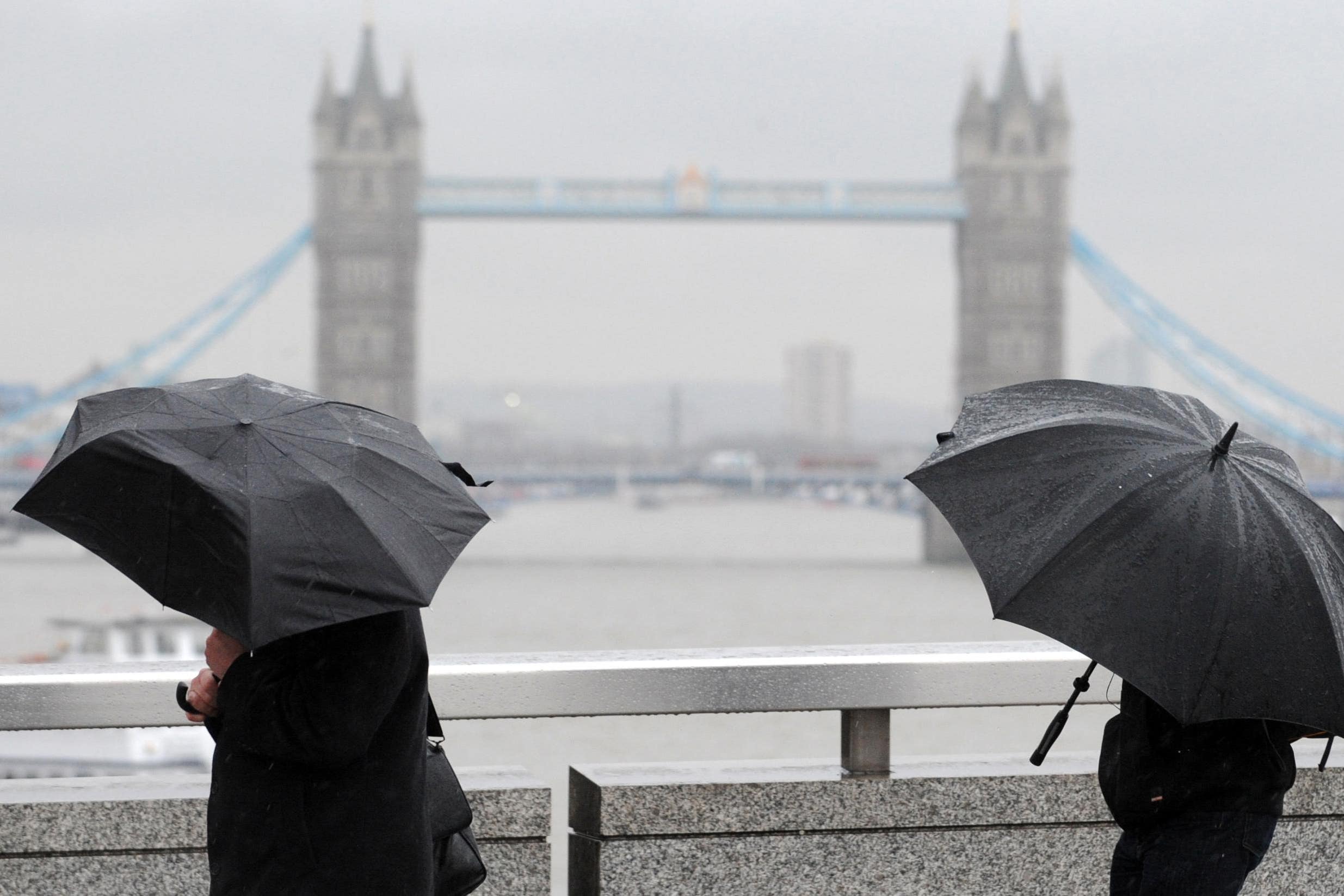 London commuters arrive in the City on London Bridge (Stefan Rousseau/PA)