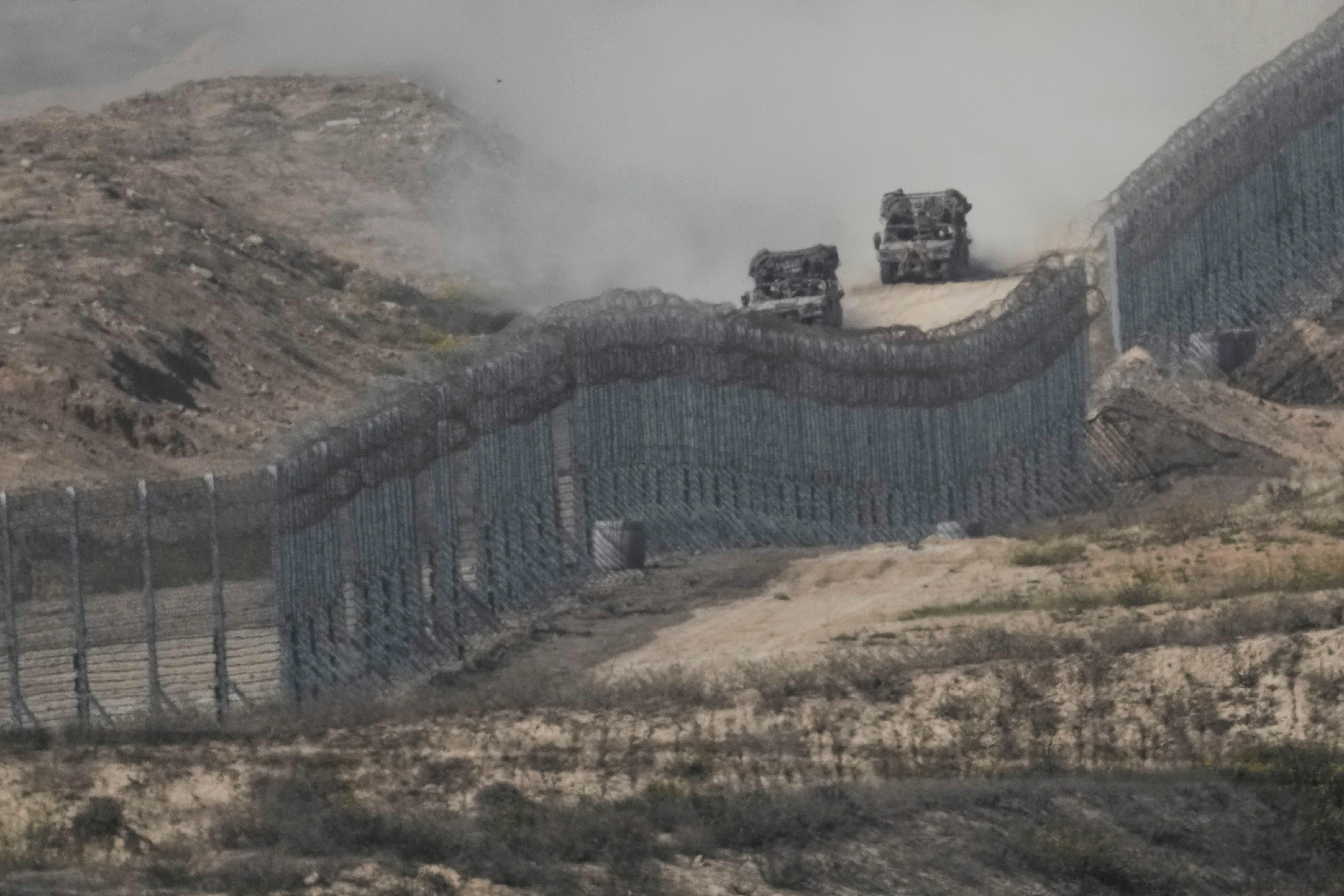 Israel has agreed to halt its Gaza offensive for four hours each day (Leo Correa/AP)