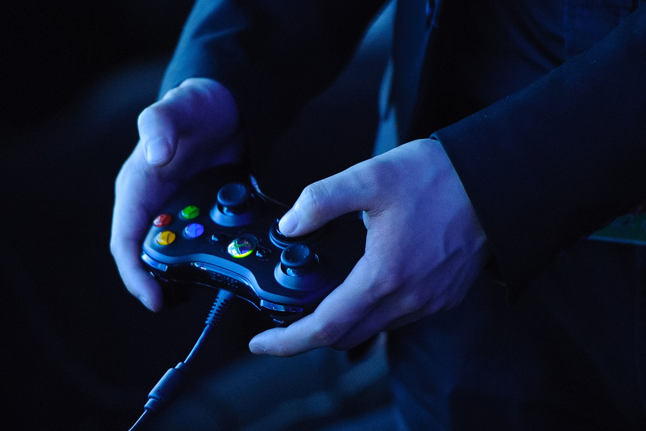 A man holds an Xbox 360 controller at a preview event for Star Trek: the Video Game, at the Science Museum, in central Lodnon.