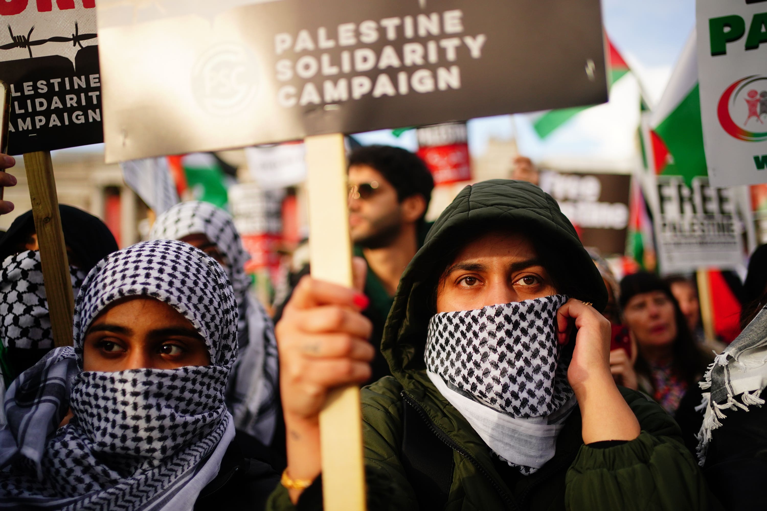 People at a rally in Trafalgar Square (Victoria Jones/PA)