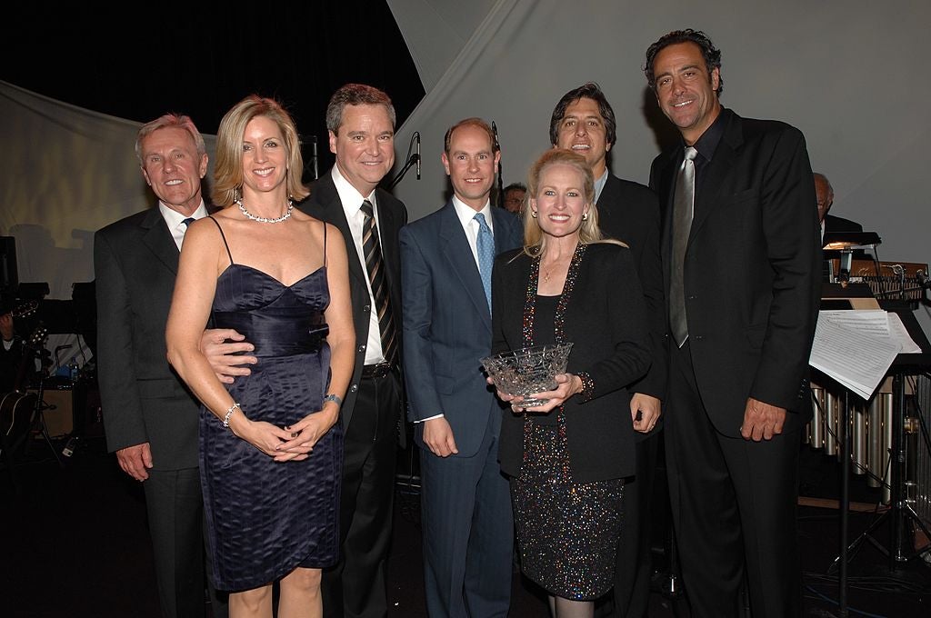 Unidentified guests pose with (third from left reading right) honoree television producer Sam Haskell, Prince Edward, Earl of Wessex, Haskell's wife, and fellow honoree, Mary Haskell, actor Ray Ramano and actor Brad Garrett at the gala fundraiser for the Viewpoint School on May 12, 2007 in Beverly Hills, California