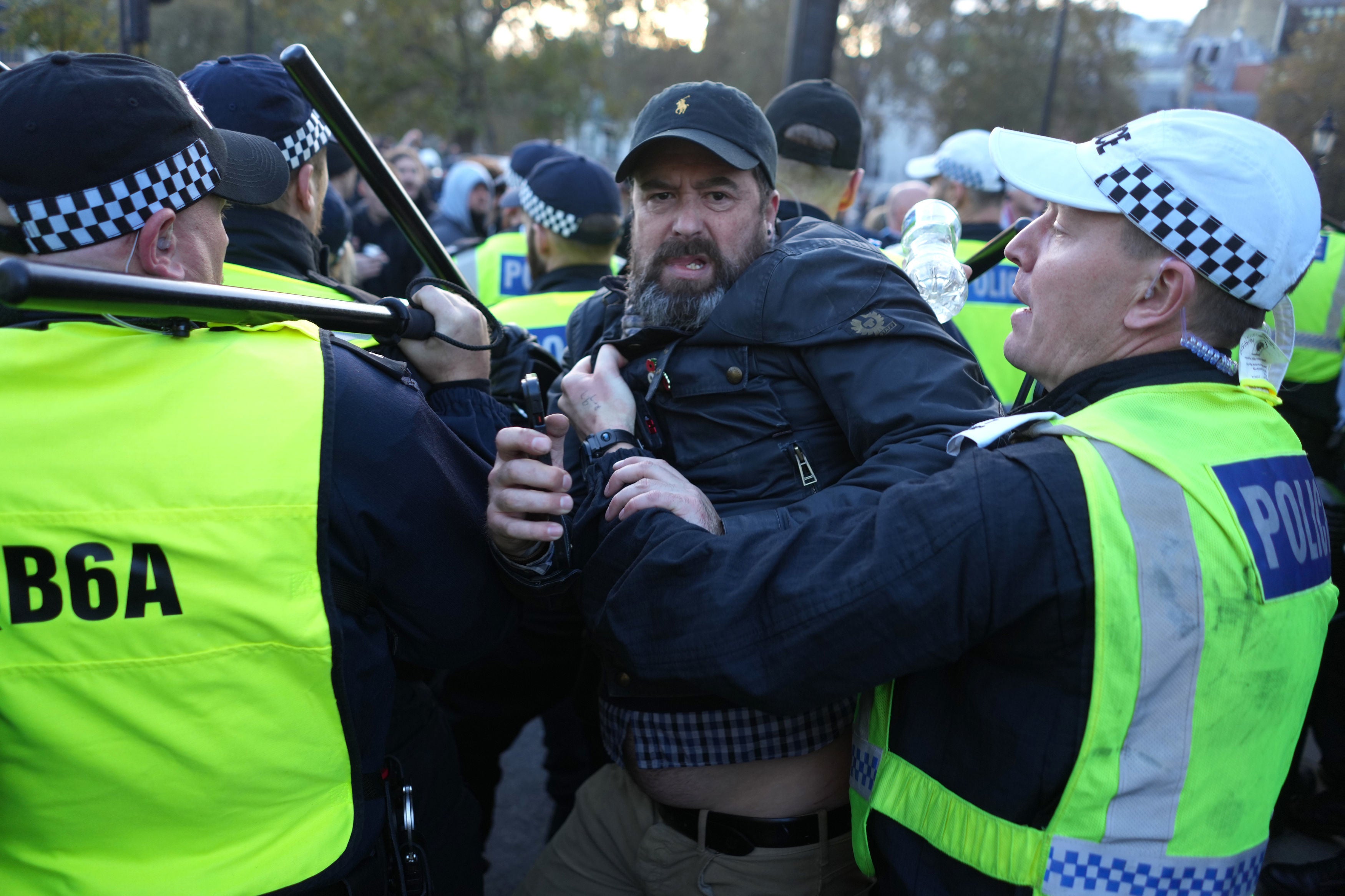 Counter-protesters clash with police in Parliament Square in central London,