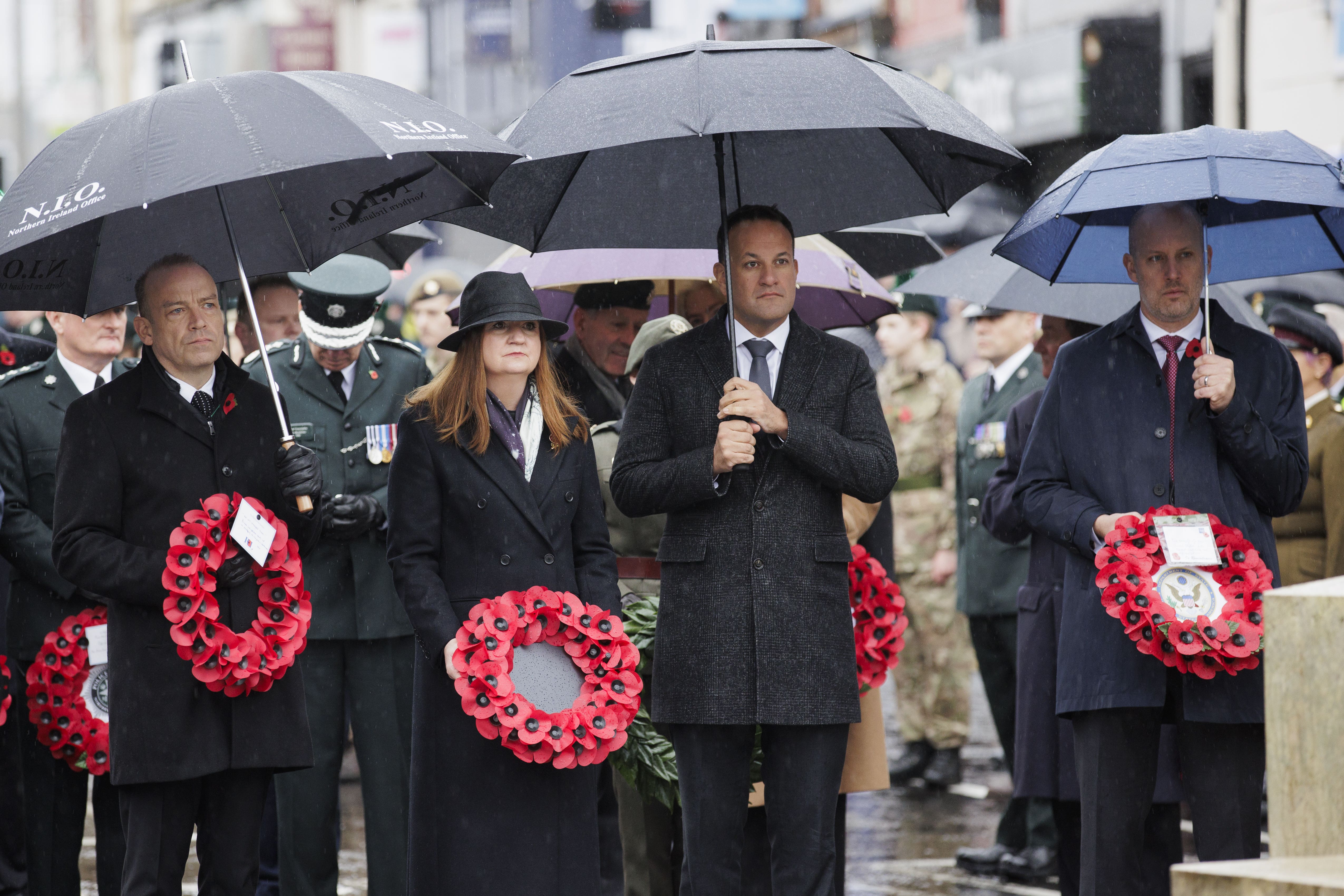 (l to r) Chris Heaton-Harris, Jayne Brady, Leo Varadkar and US Consul General Belfast James Applegate attended the Remembrance Sunday service at the Cenotaph in Enniskillen (Liam McBurney/PA)