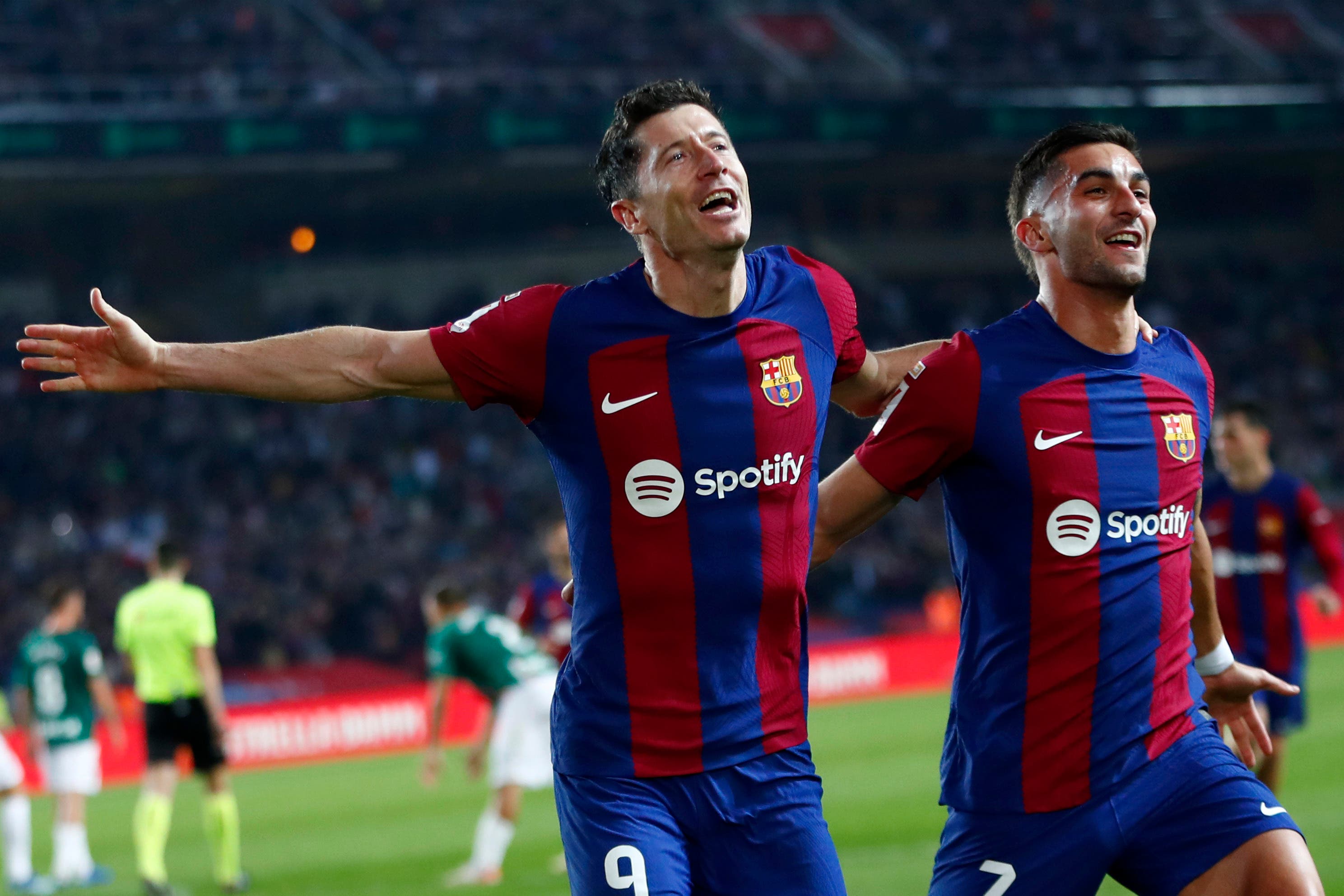 Robert Lewandowski struck twice as Barcelona beat Alaves (Joan Monfort/AP)