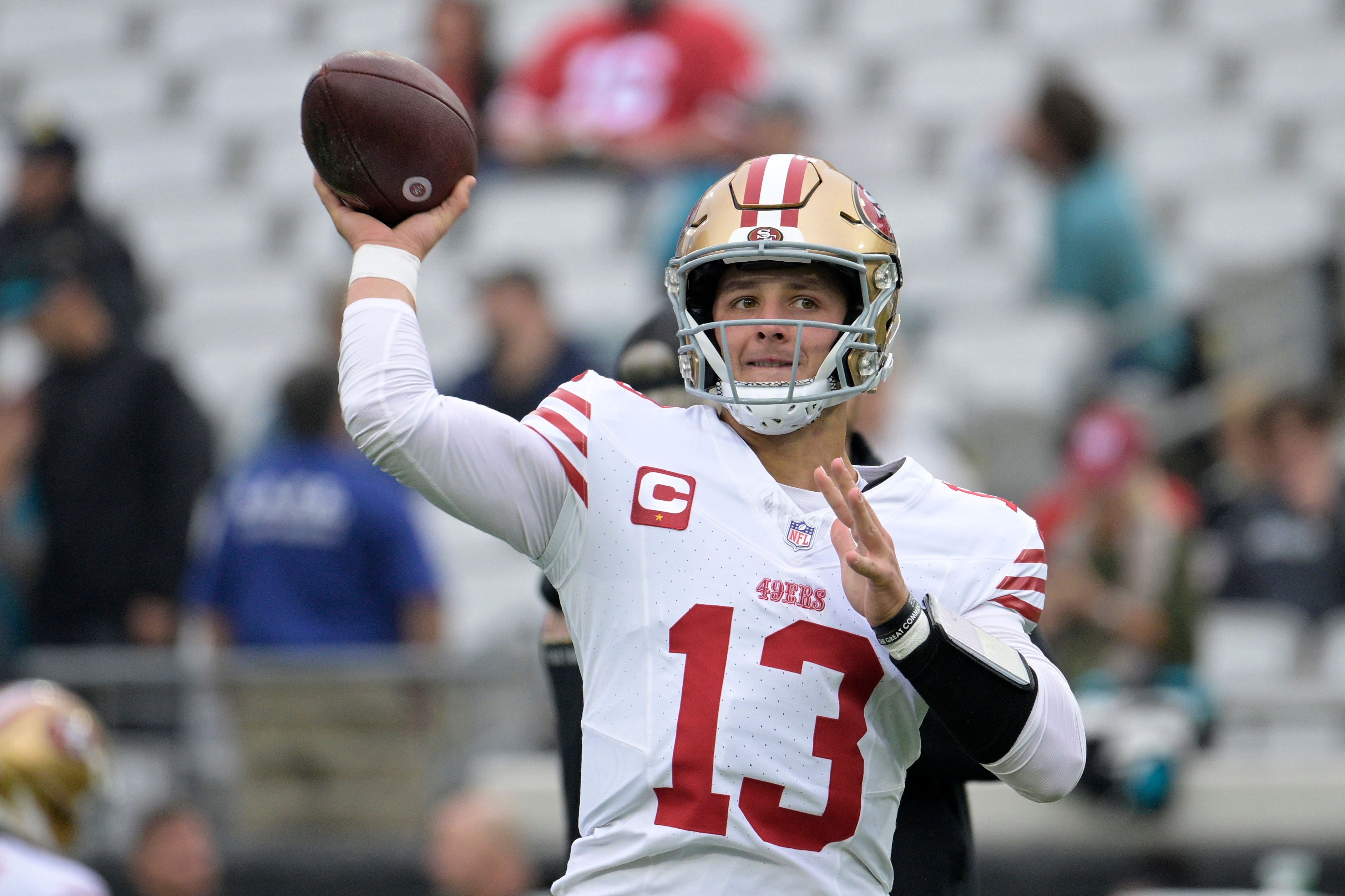 San Francisco 49ers quarterback Brock Purdy (13) warms up before an NFL football game against the Jacksonville Jaguars (Phelan M Ebenhack/AP)