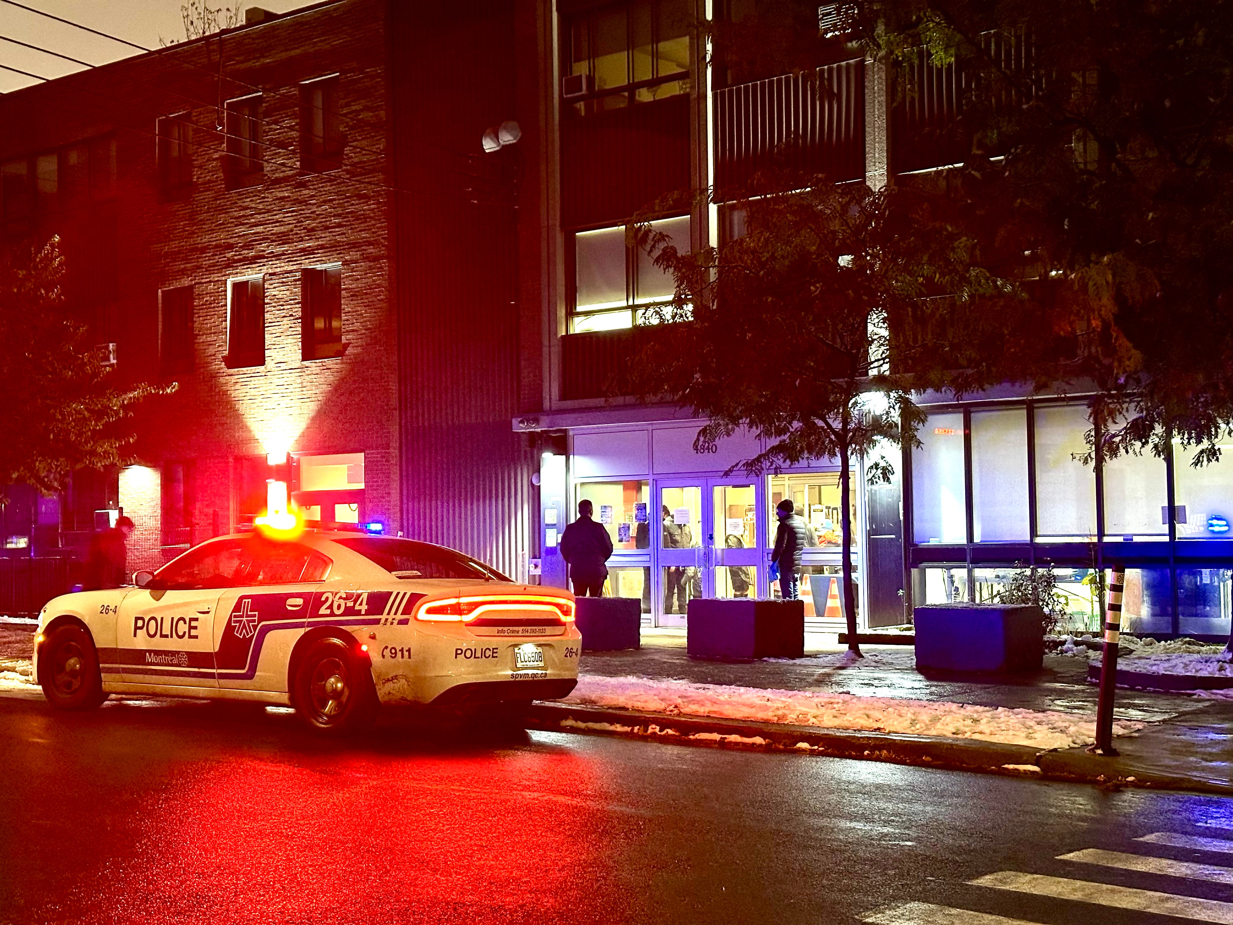 File: Police cars sit in front of Talmud Torah Elementary School as parents pick up their children in the Cote-des-Neiges neighborhood of Montreal, Quebec, Canada, on 9 November 2023