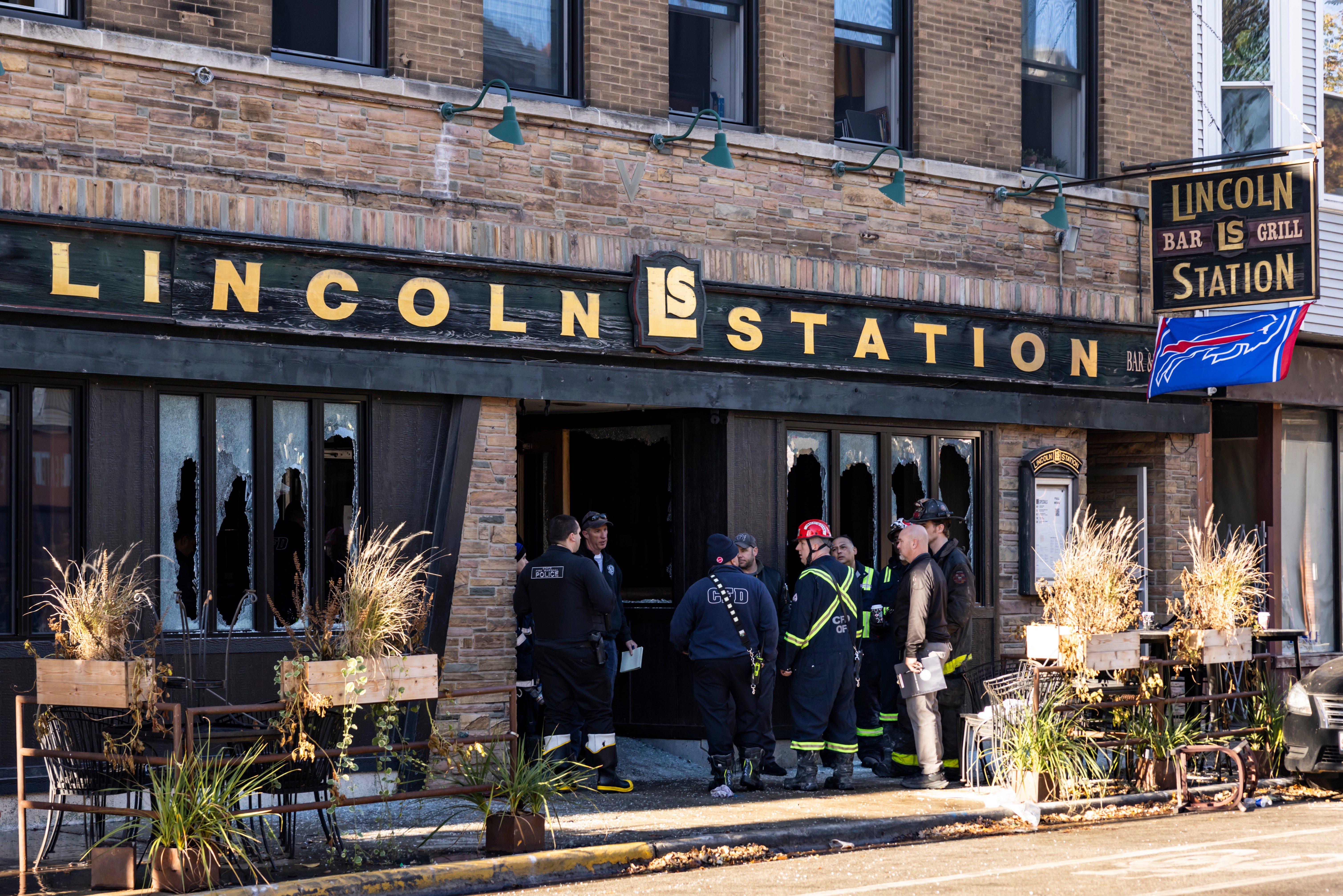 Chicago Fire Department personnel investigate the blaze