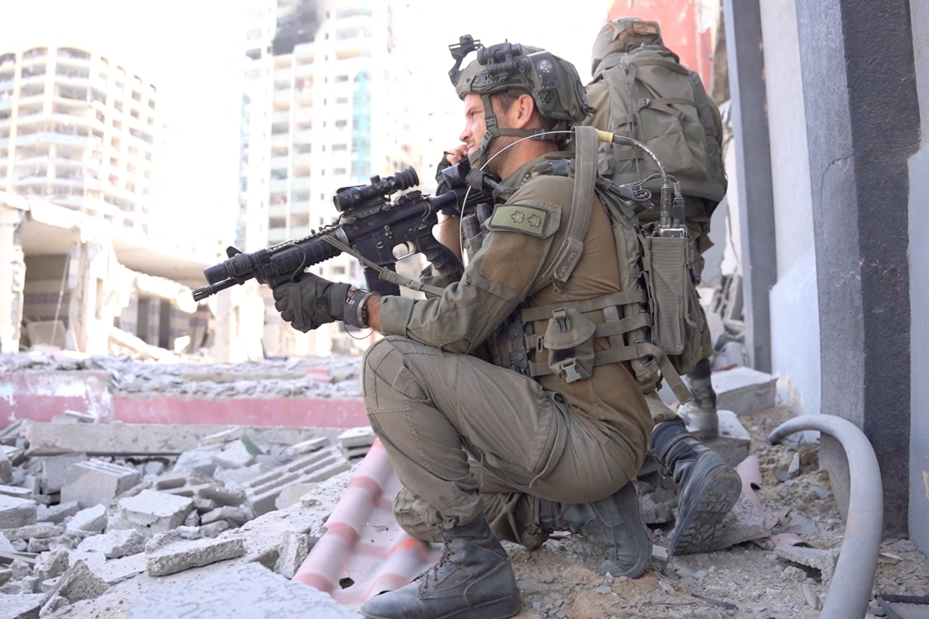 Israeli soldiers operate amid what the Israeli army says is the ongoing ground operation against Hamas