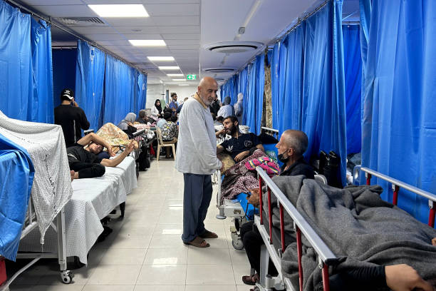 Patients and internally displaced people are pictured at Al-Shifa Hospital in Gaza City