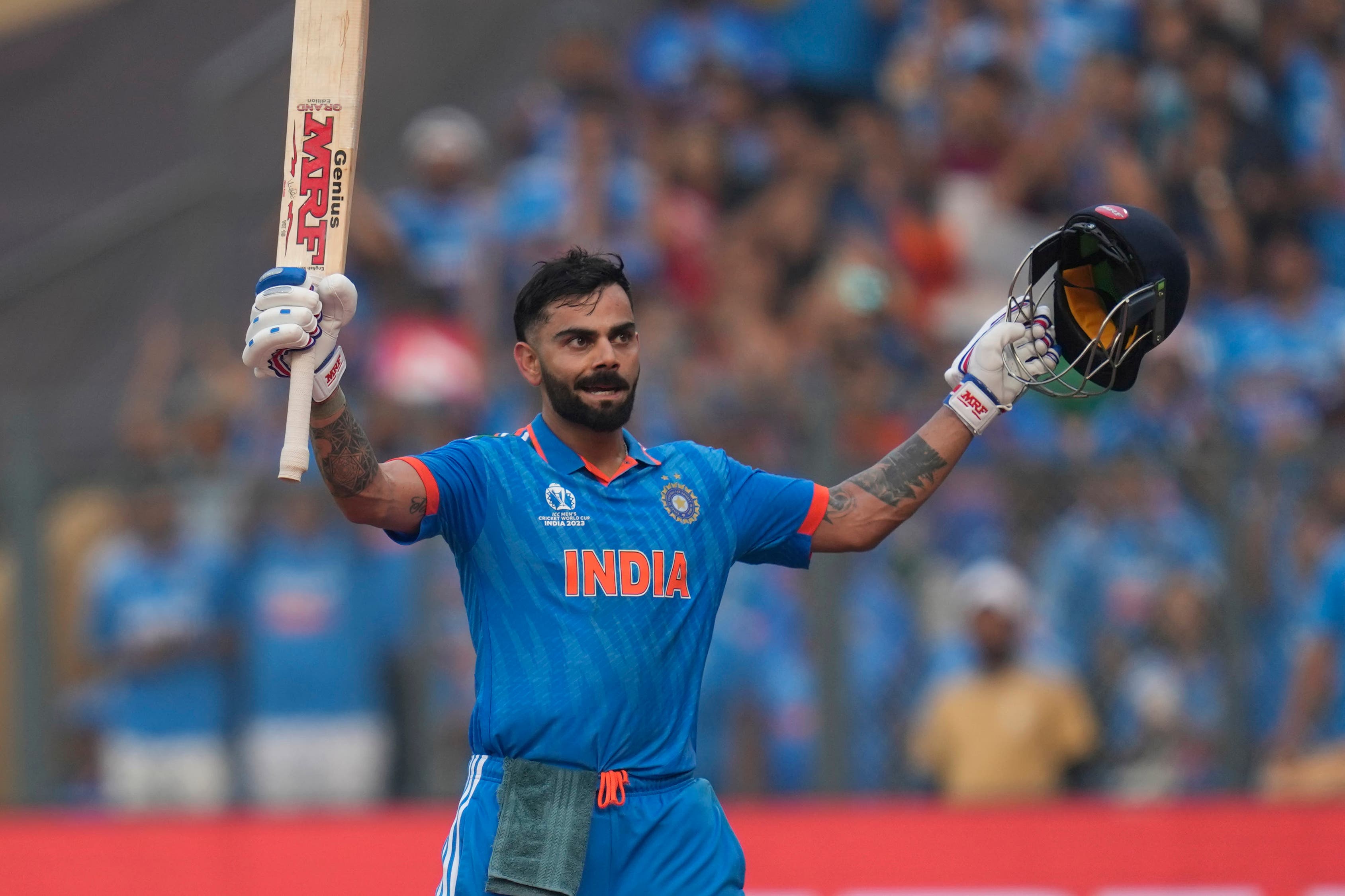 Virat Kohli carried India into the World Cup final in style (Rafiq Maqbool/AP)