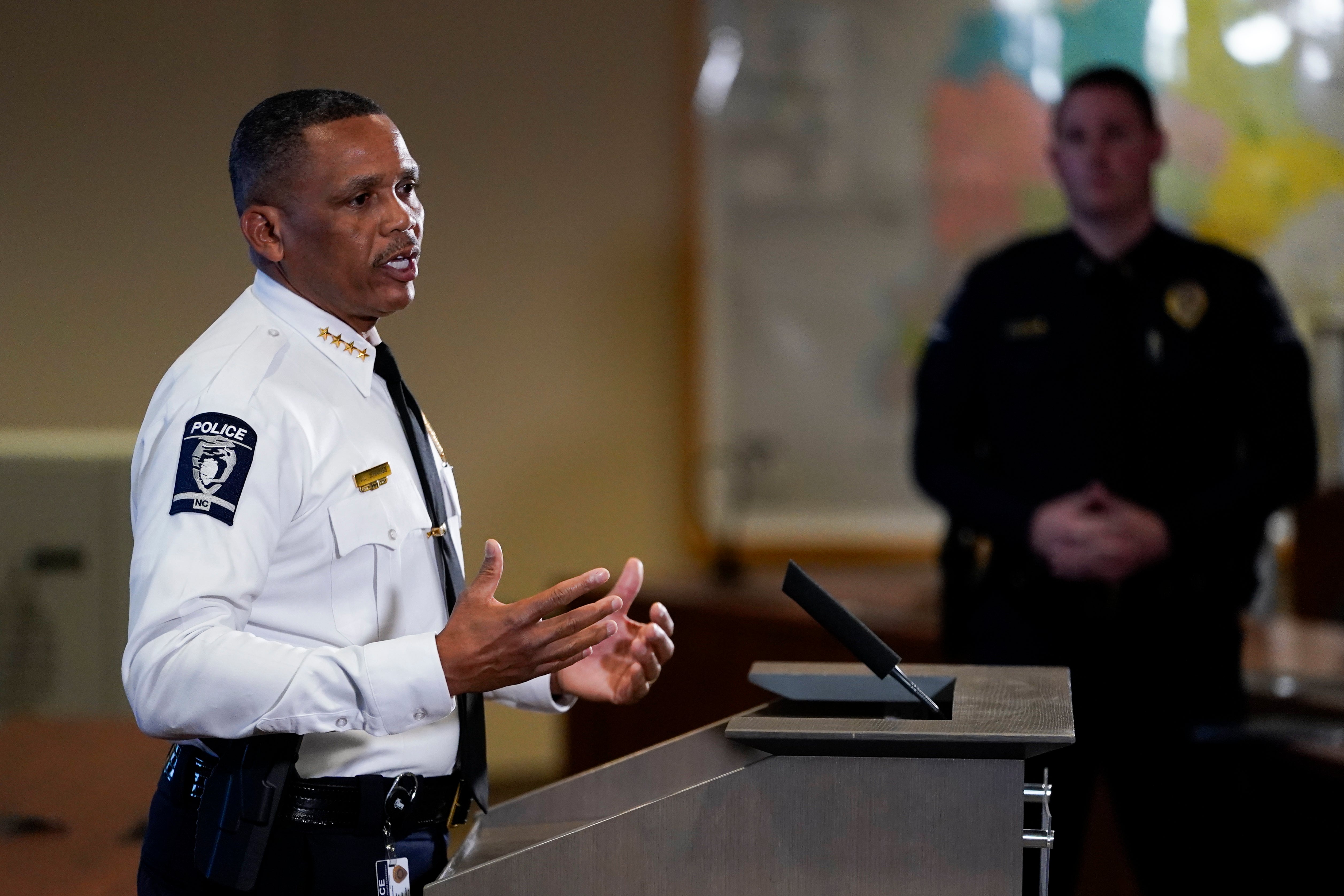 Officer-Strikes Woman