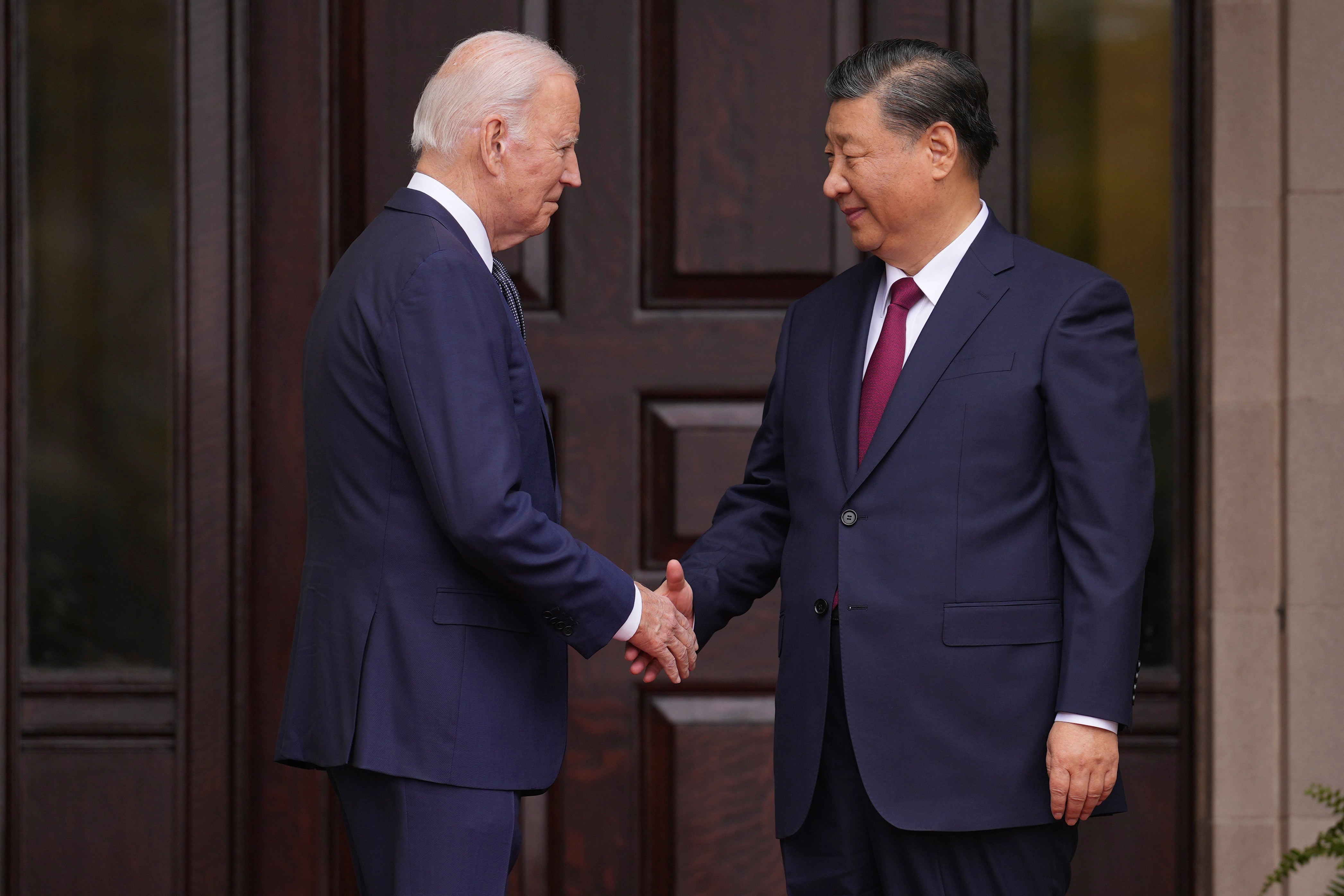 President Joe Biden greets China's President President Xi Jinping at the Filoli Estate in Woodside, California