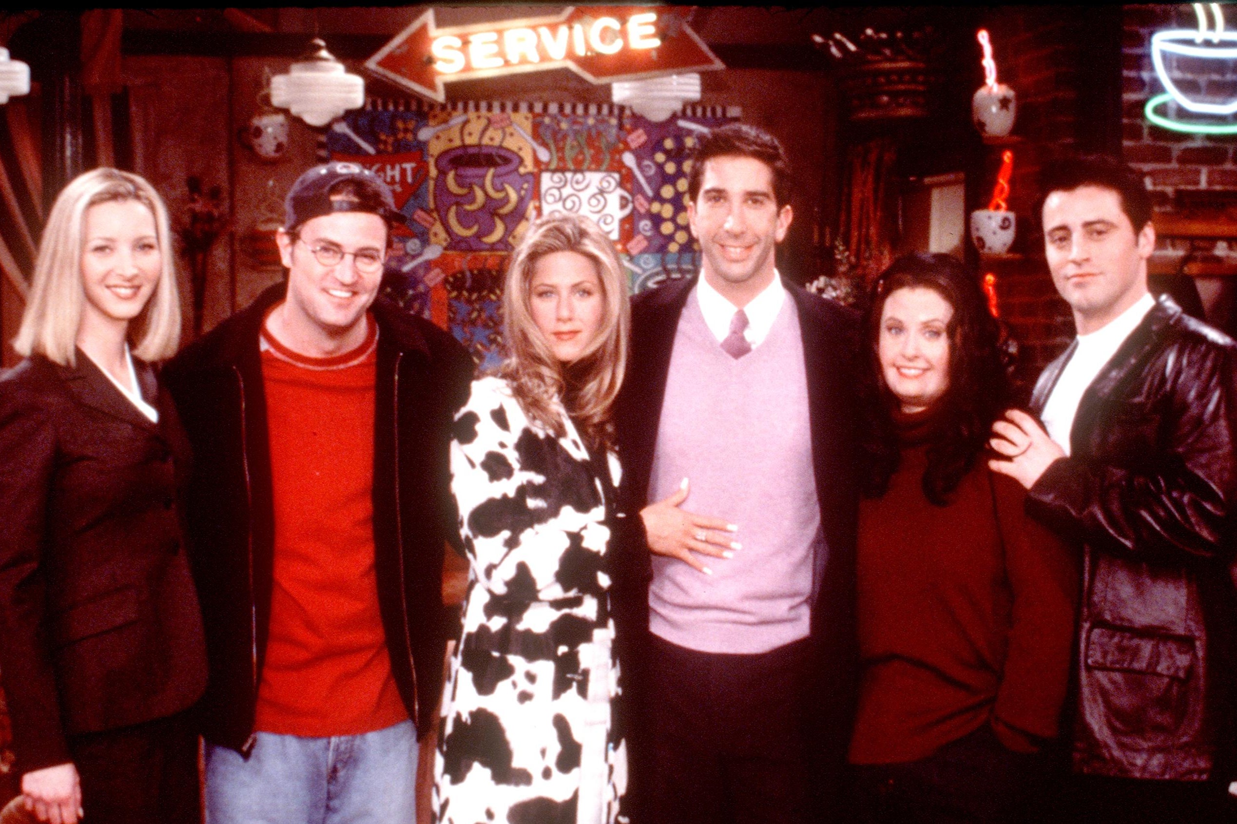 Friends for life: Perry with his co-stars in the hit sitcom