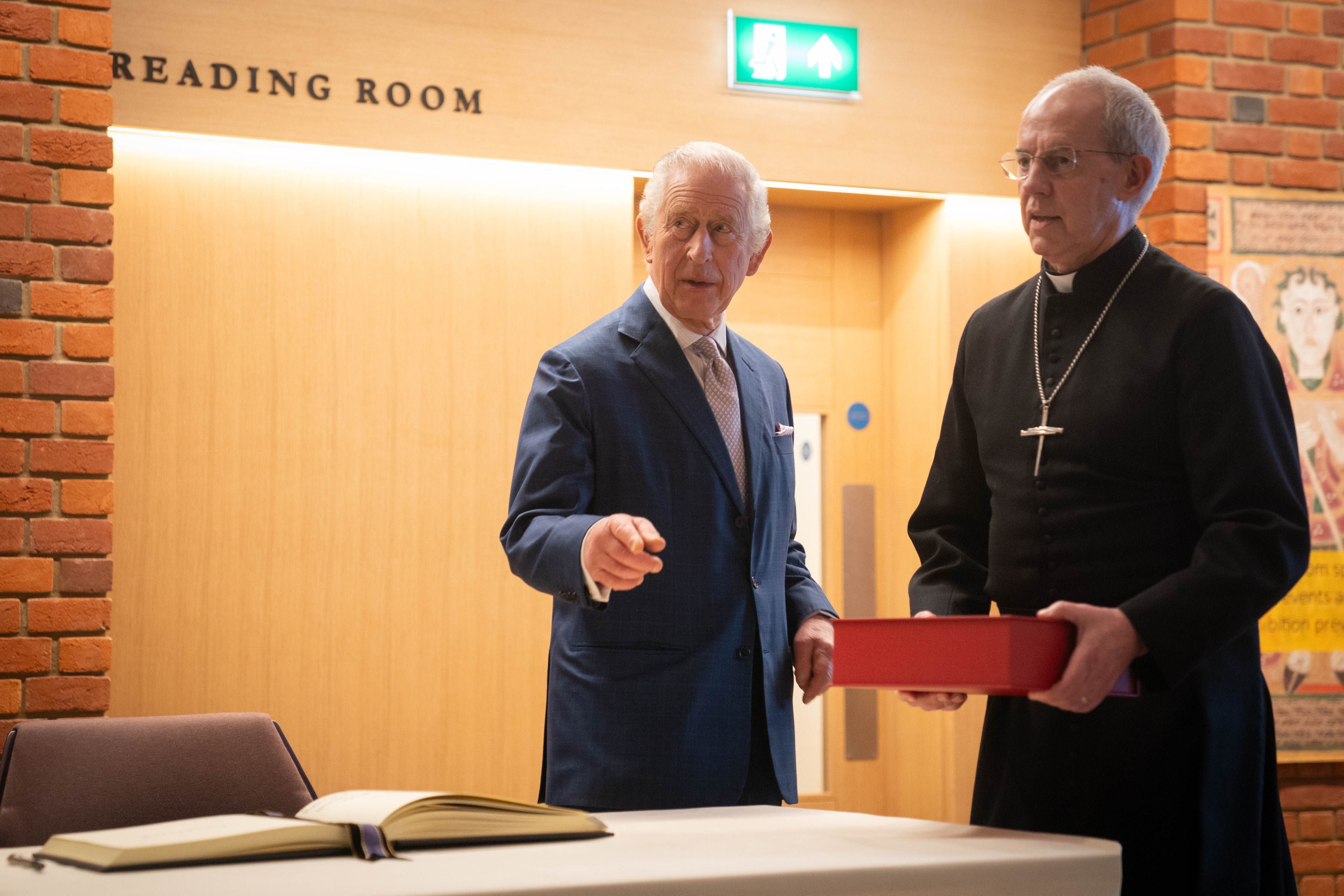 Archbishop of Canterbury showed King Charles different religious artefacts at the library