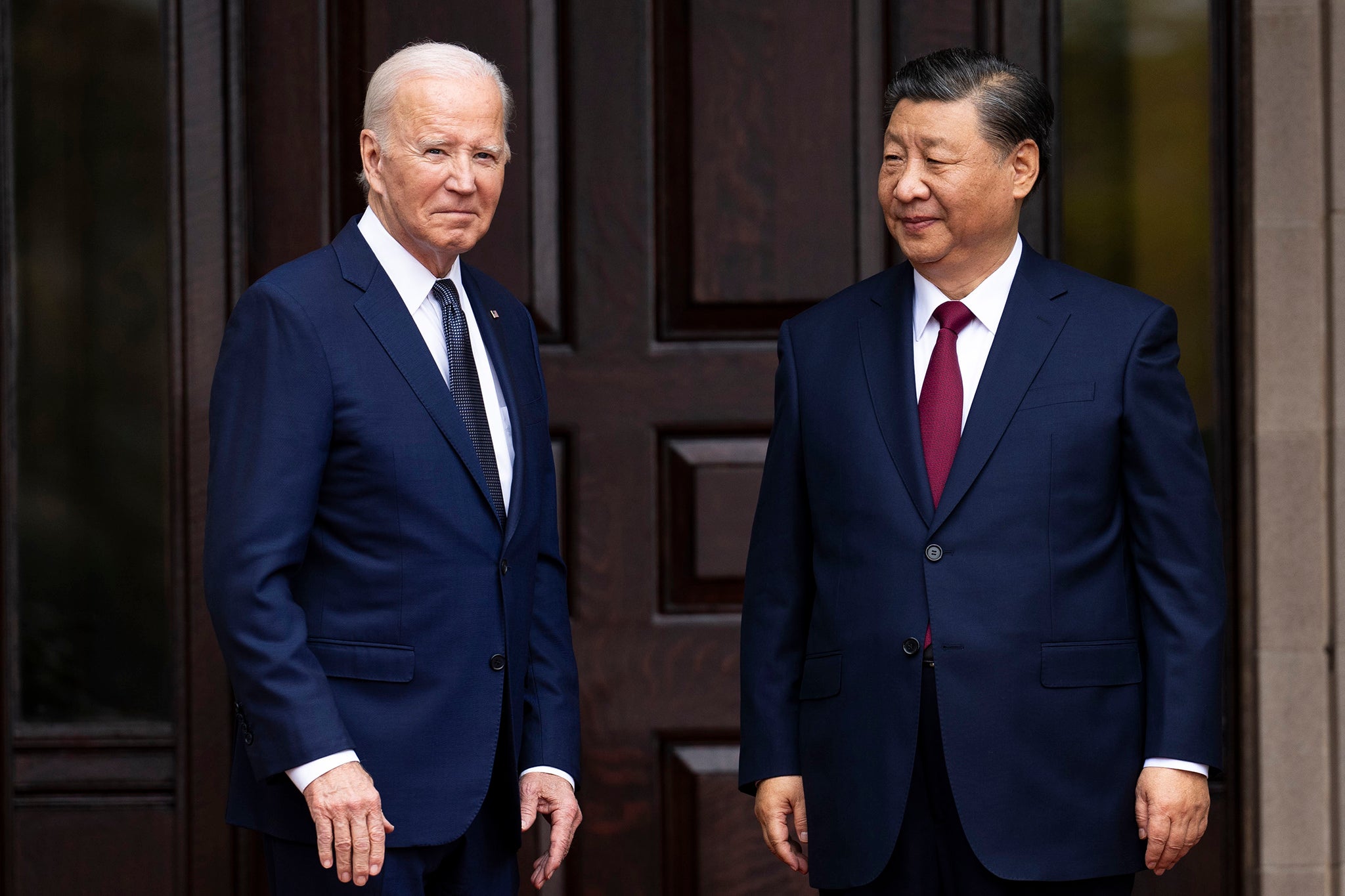 President Joe Biden greets China's President President Xi Jinping at the Filoli Estate in Woodside, Calif., Wednesday, Nov, 15, 2023, on the sidelines of the Asia-Pacific Economic Cooperative conference