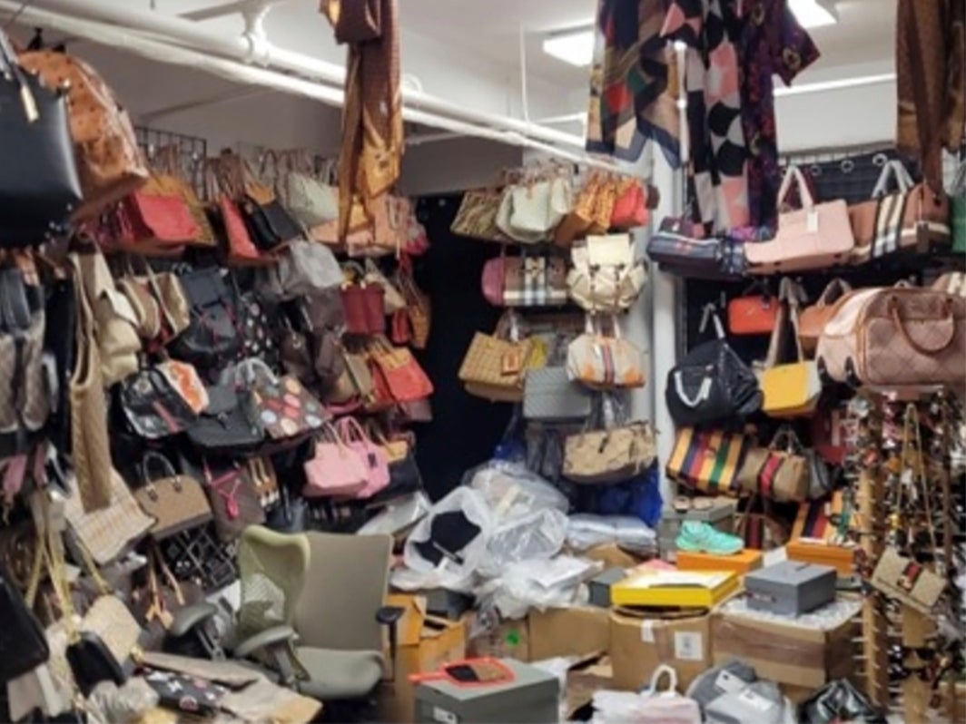 This photo provided by the U.S. Attorney for the Southern District of New York shows counterfeit goods from a storage unit in New York