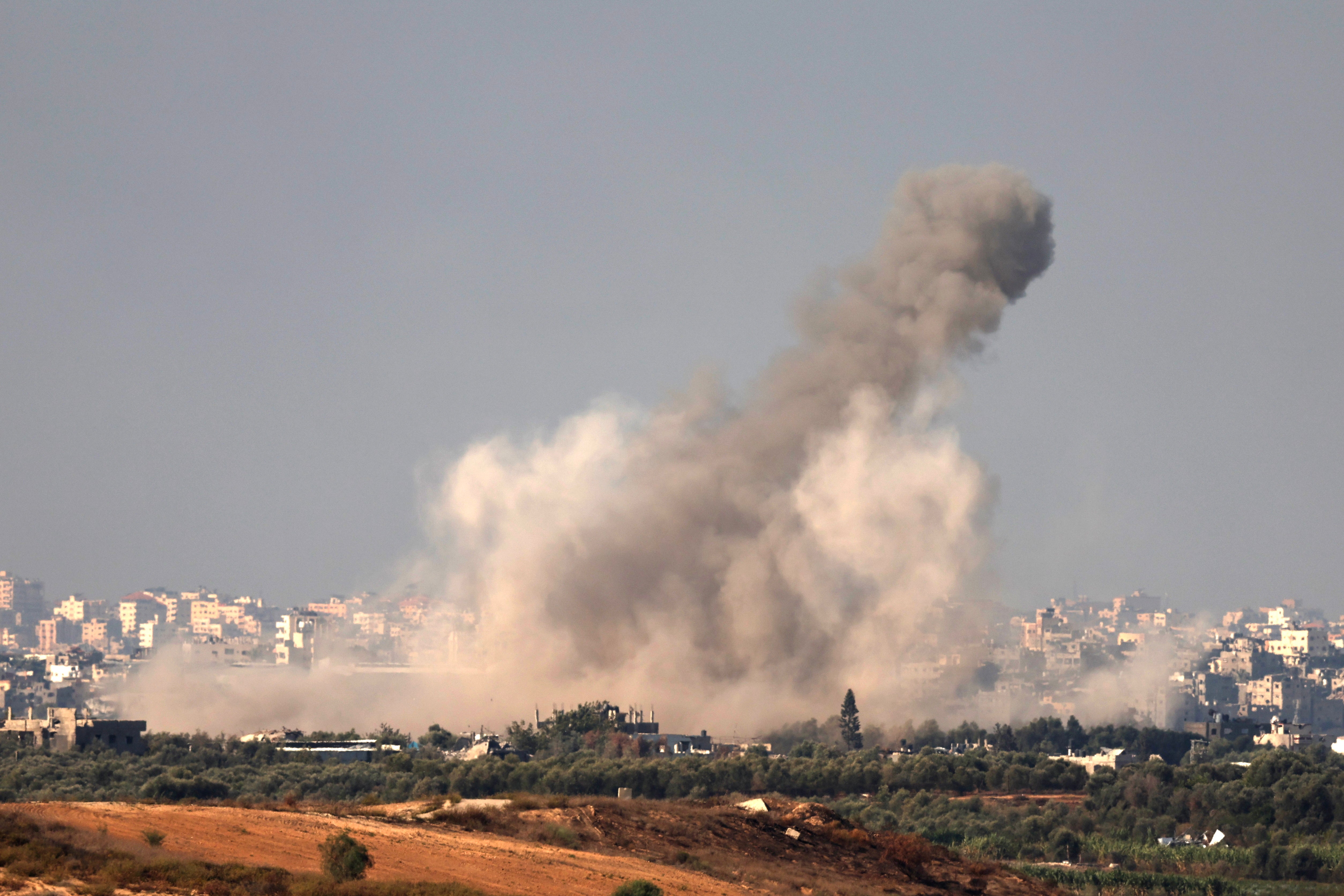 Smoke rises during an explosion following an Israeli air strike on the northern part of the Gaza Strip