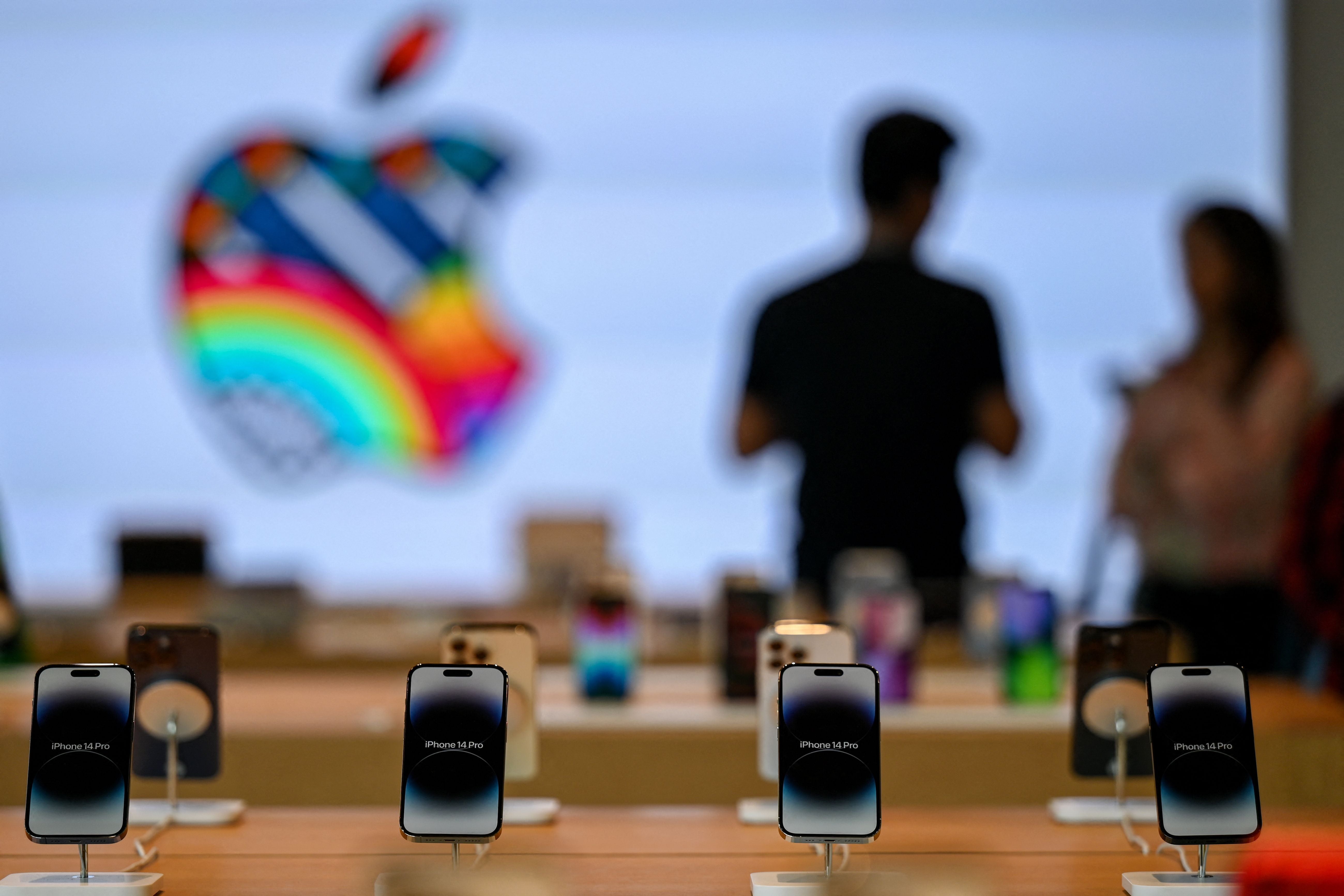 iPhones are on display inside the new Apple retail store during a media preview on the eve of its opening in Mumbai on April 17, 2023