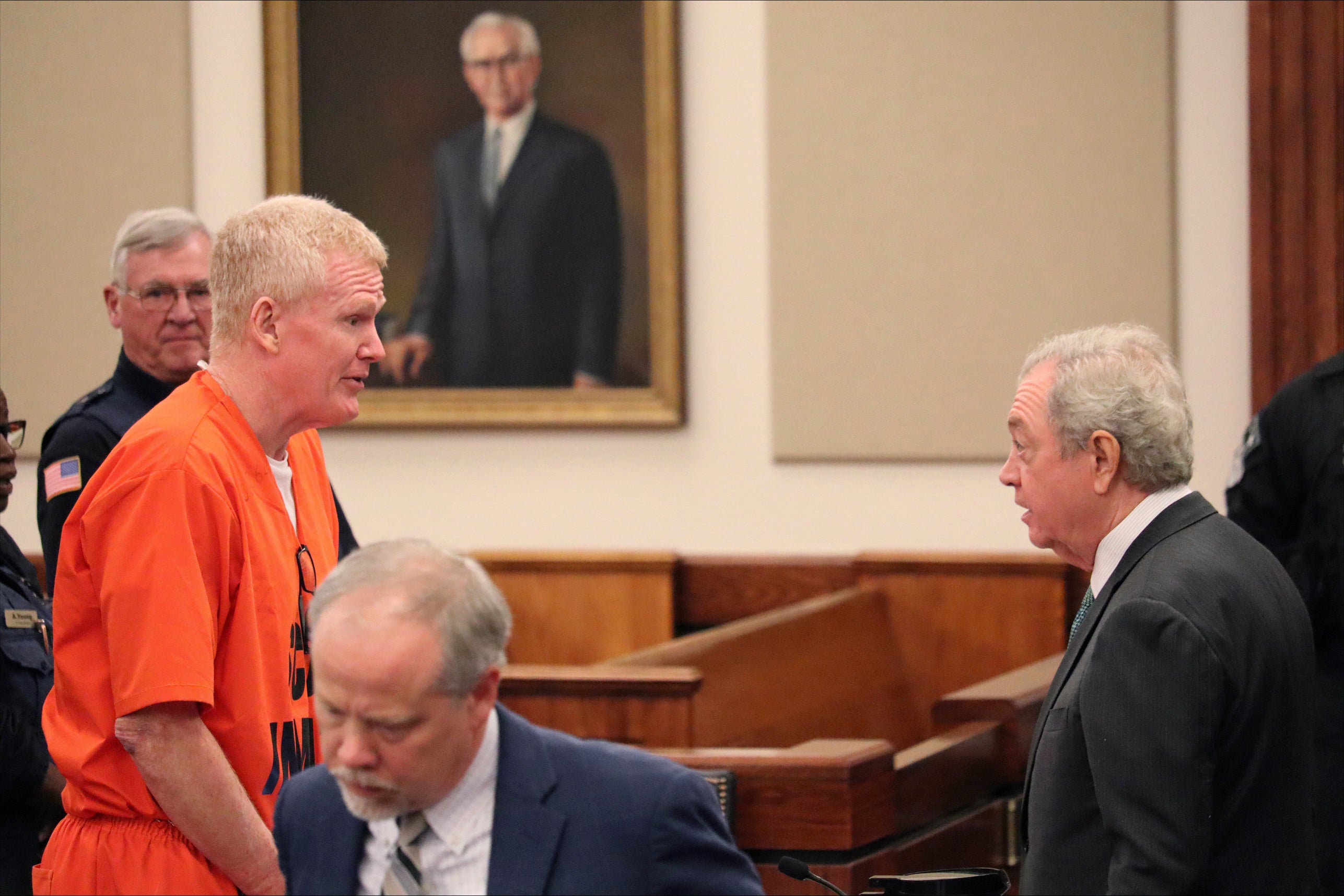 Convicted murderer Alex Murdaugh speaks with his defense attorney, Dick Harpootlian, in Beaufort County