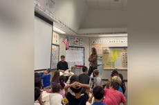 Children scream as teacher’s boyfriend hijacks class to propose to her