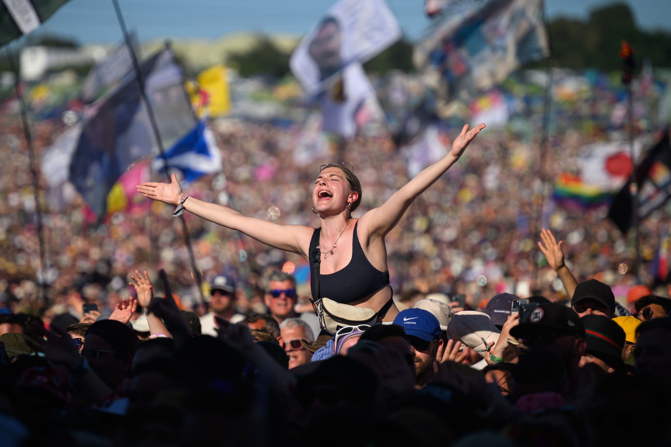 People sing along as Lewis Capaldi performs on the Pyramid Stage on Day 4 of Glastonbury Festival 2023