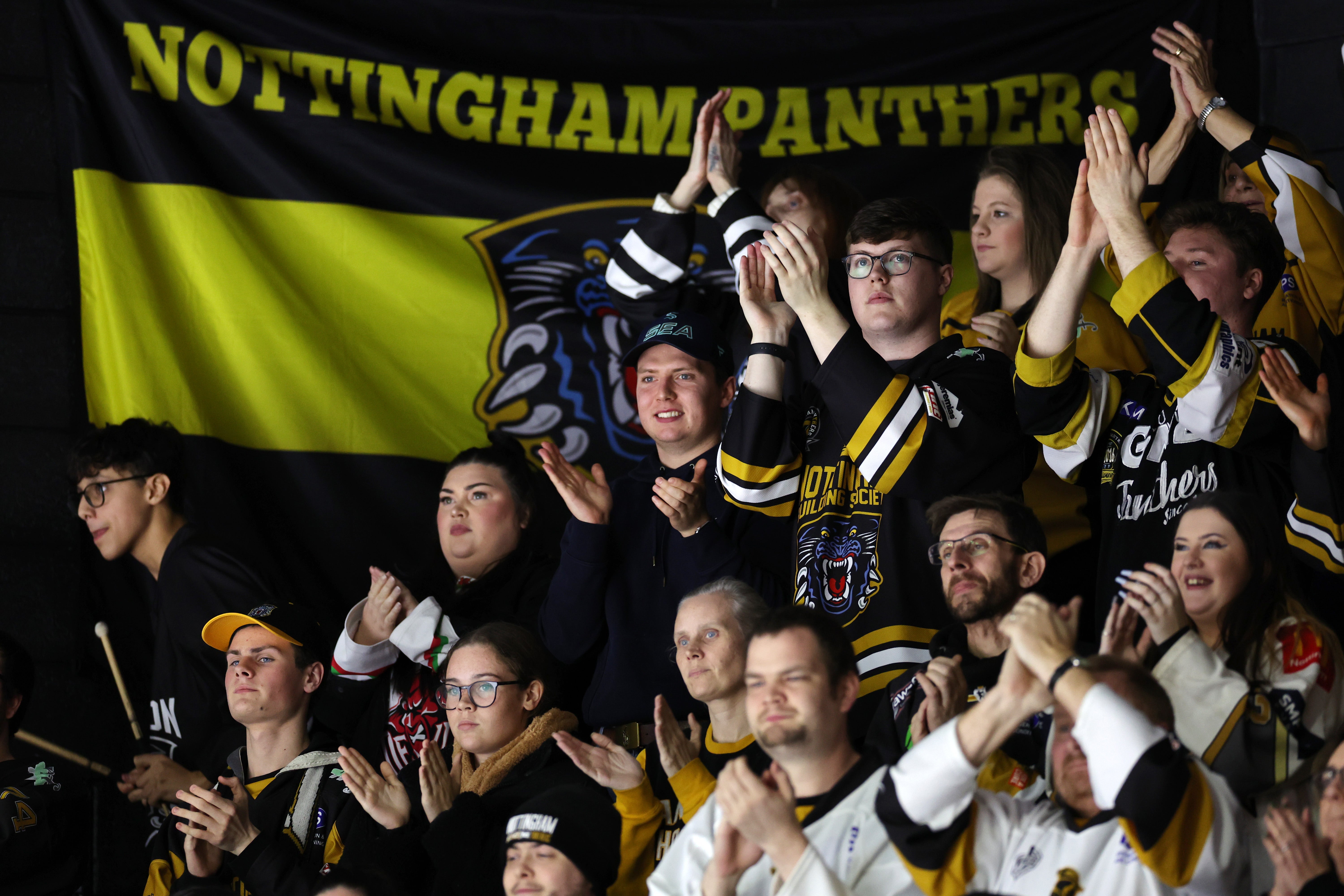 Fans applaud in the 47th match minute as a tribute to Adam Johnson