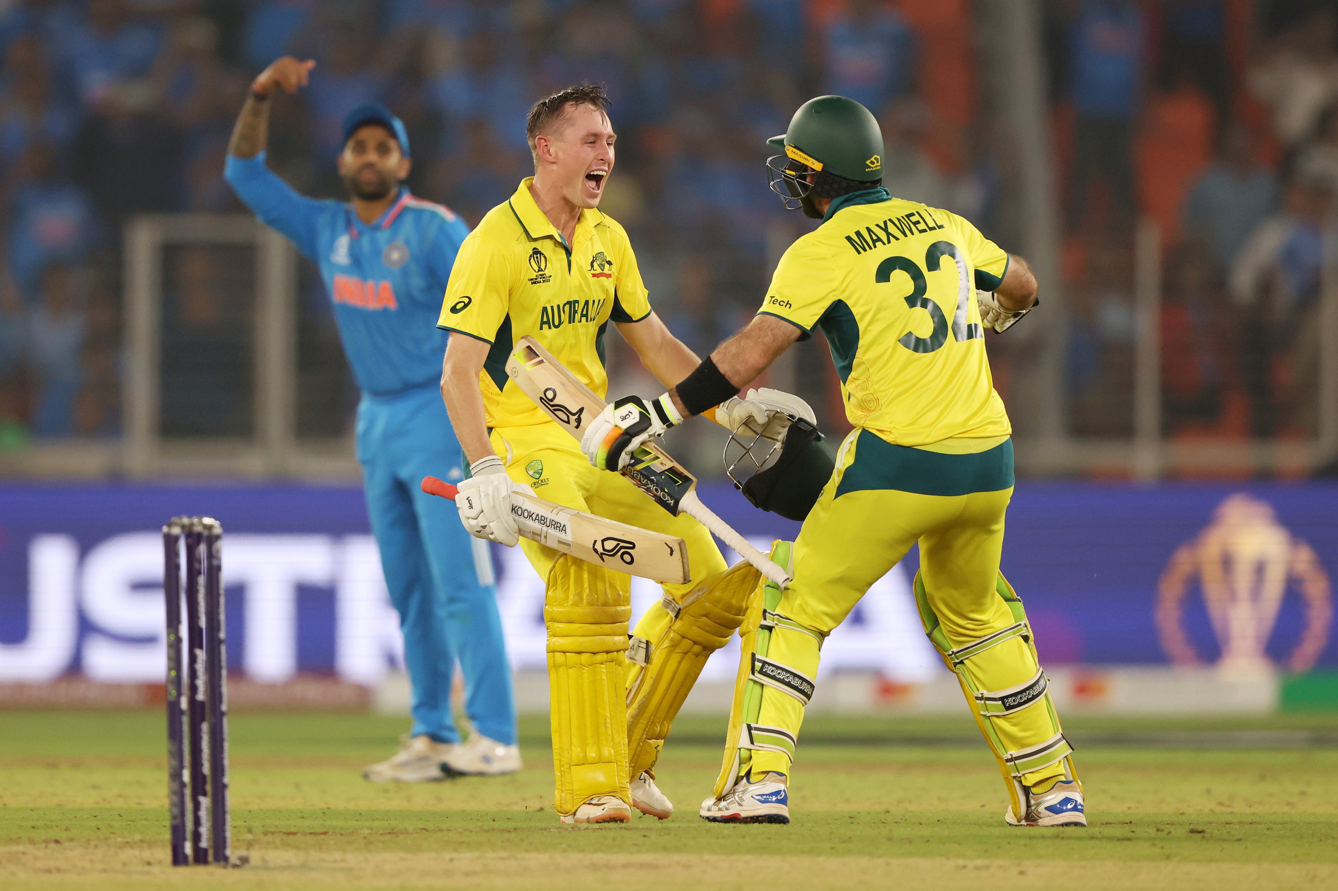 Marnus Lasbuchagne and Glenn Maxwell celebrate the moment of victory