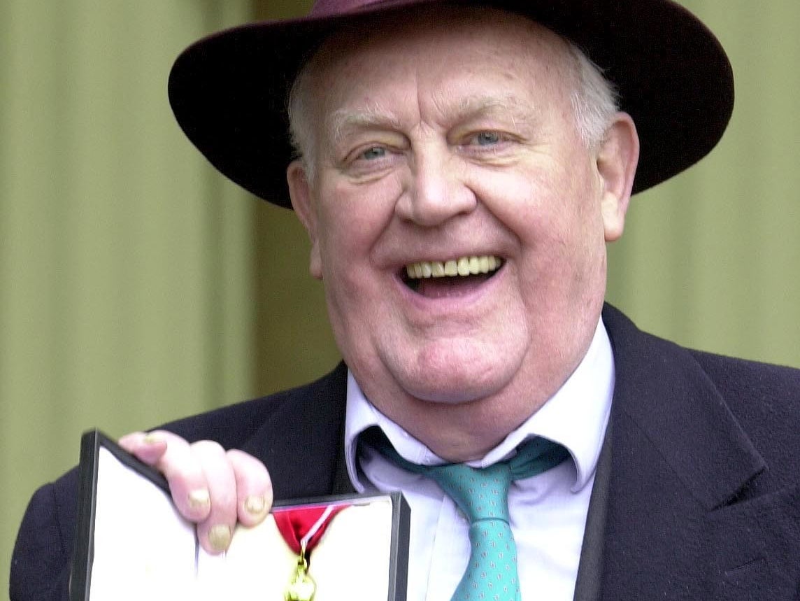 Joss Ackland, 73, after he received a CBE from Britain's Queen Elizabeth II