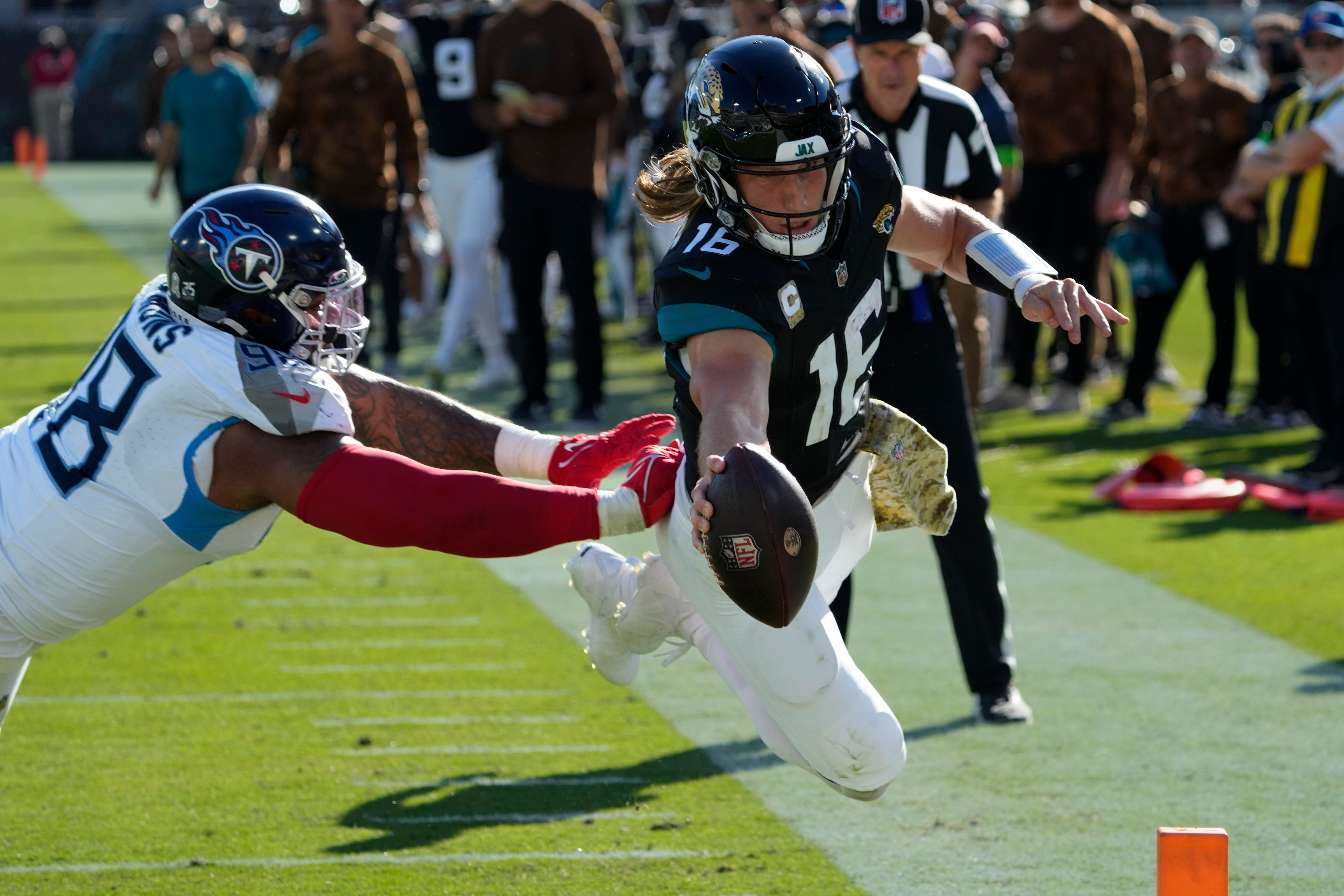 Trevor Lawrence provided four touchdowns as the Jaguars beat the Titans 34-14 (John Raoux/AP)