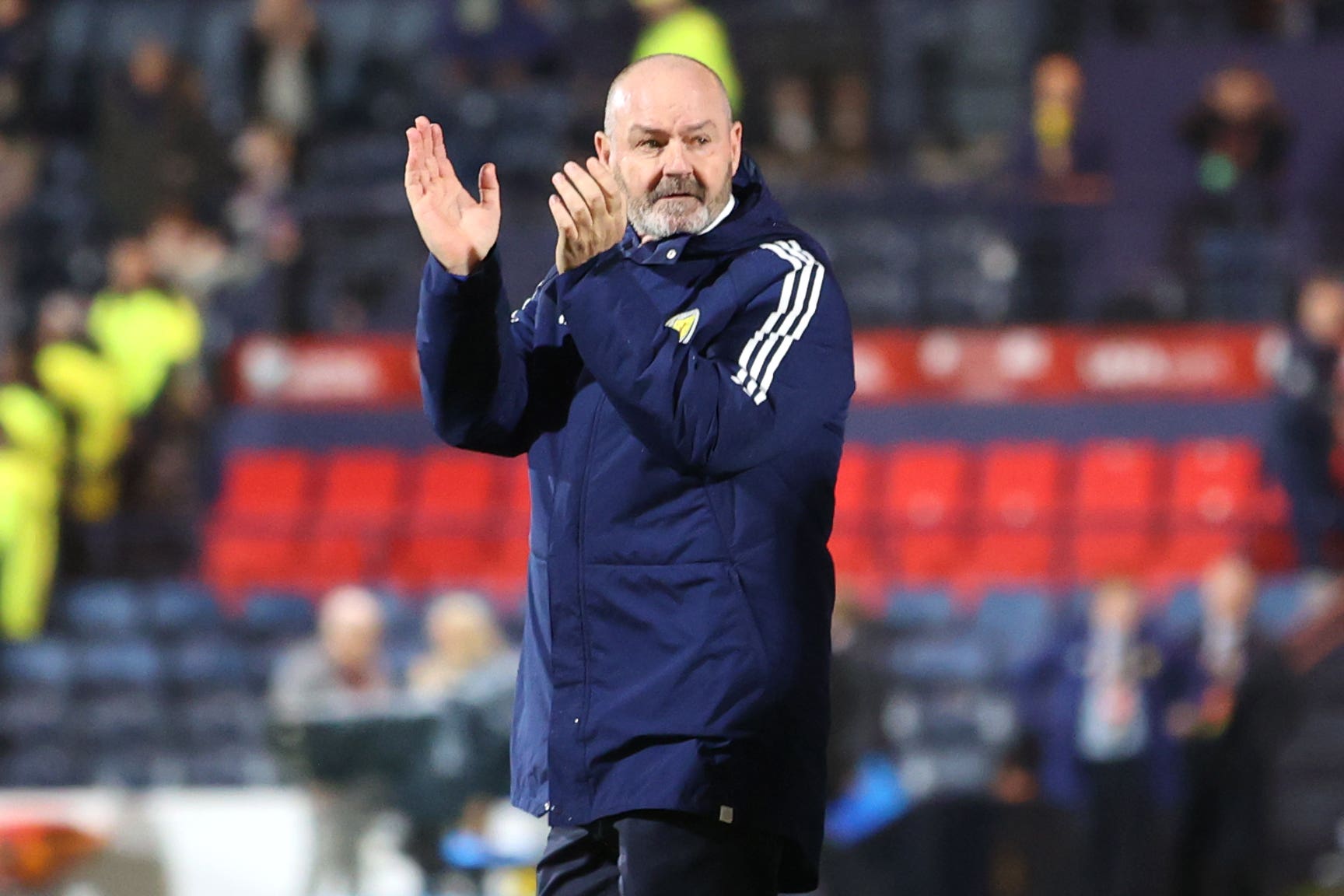 Steve Clarke applauds the fans following the end of Euro 2024 qualification (Steve Welsh/PA)