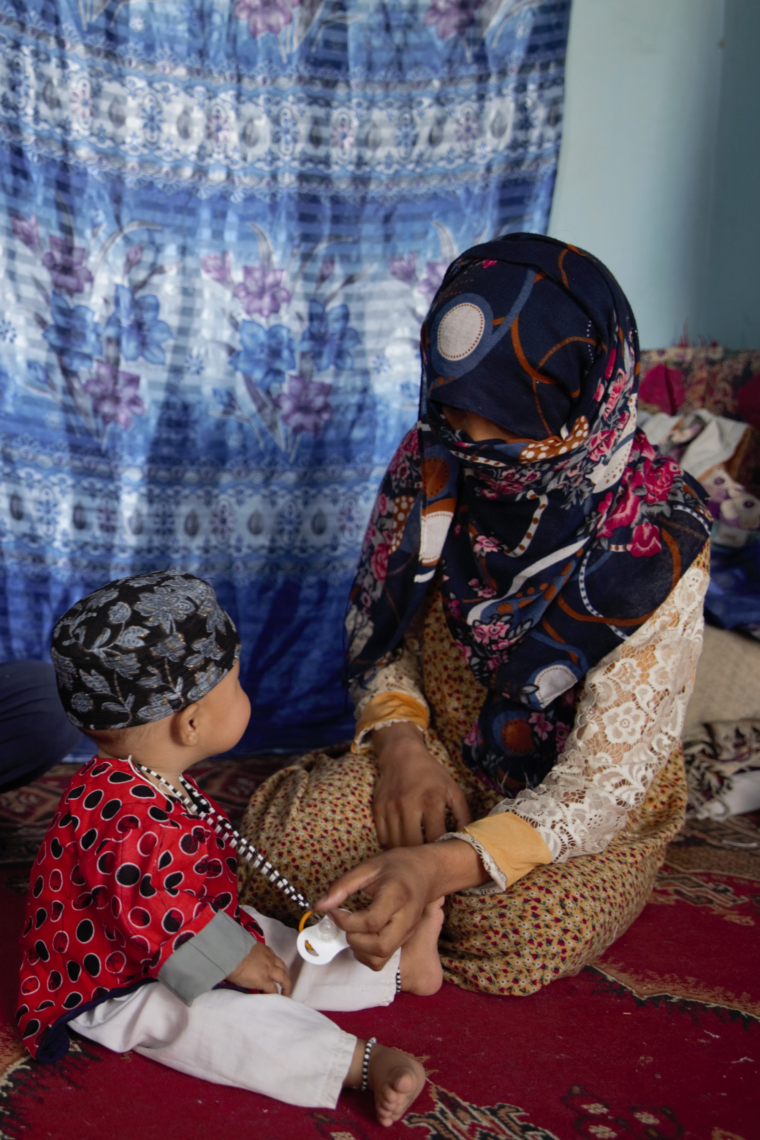 Zolaikha, 23, with Marium, aged 10 months