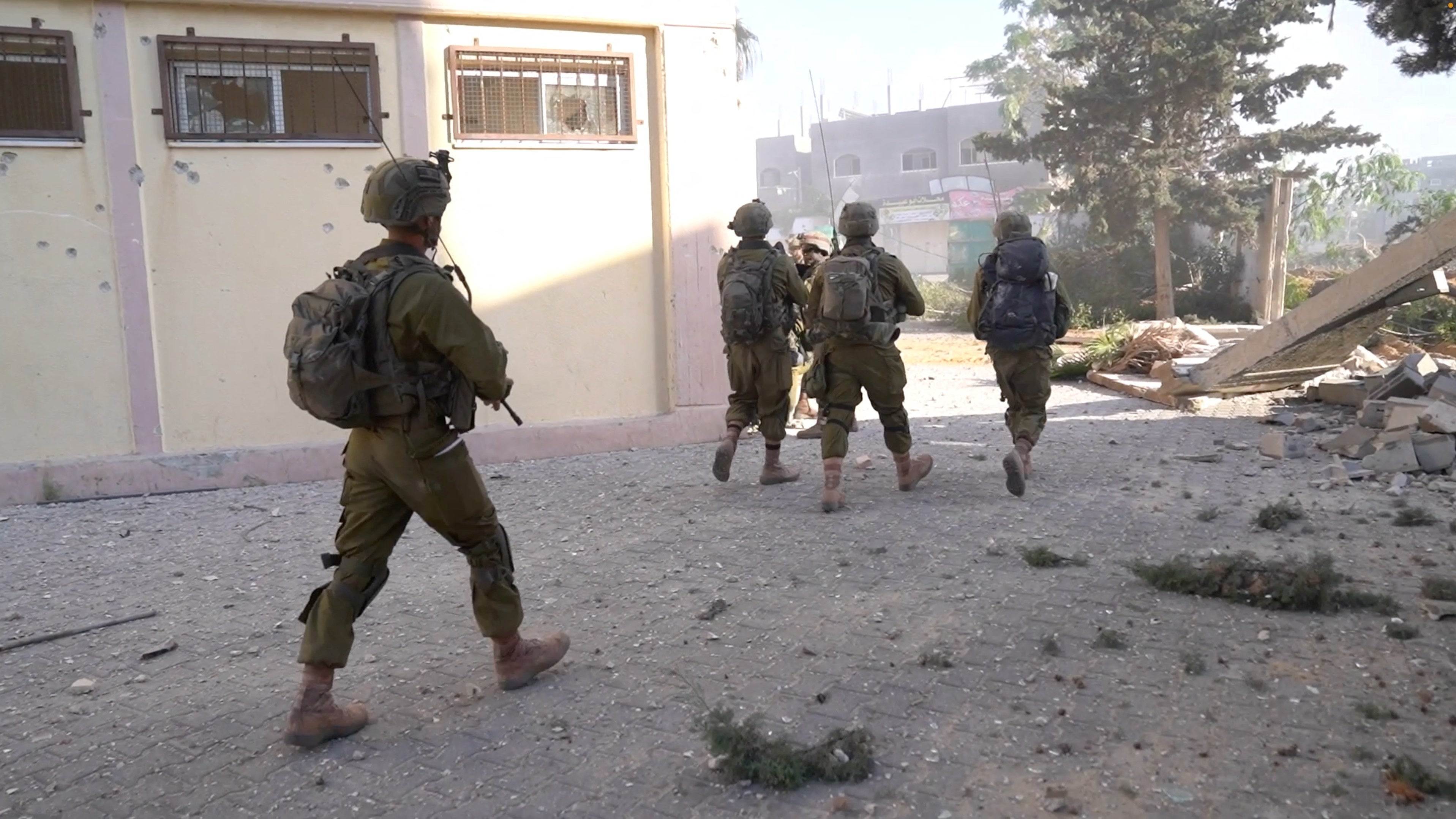 Israeli soldiers operate in a location given as Gaza, amid the ongoing ground operation of the Israeli army