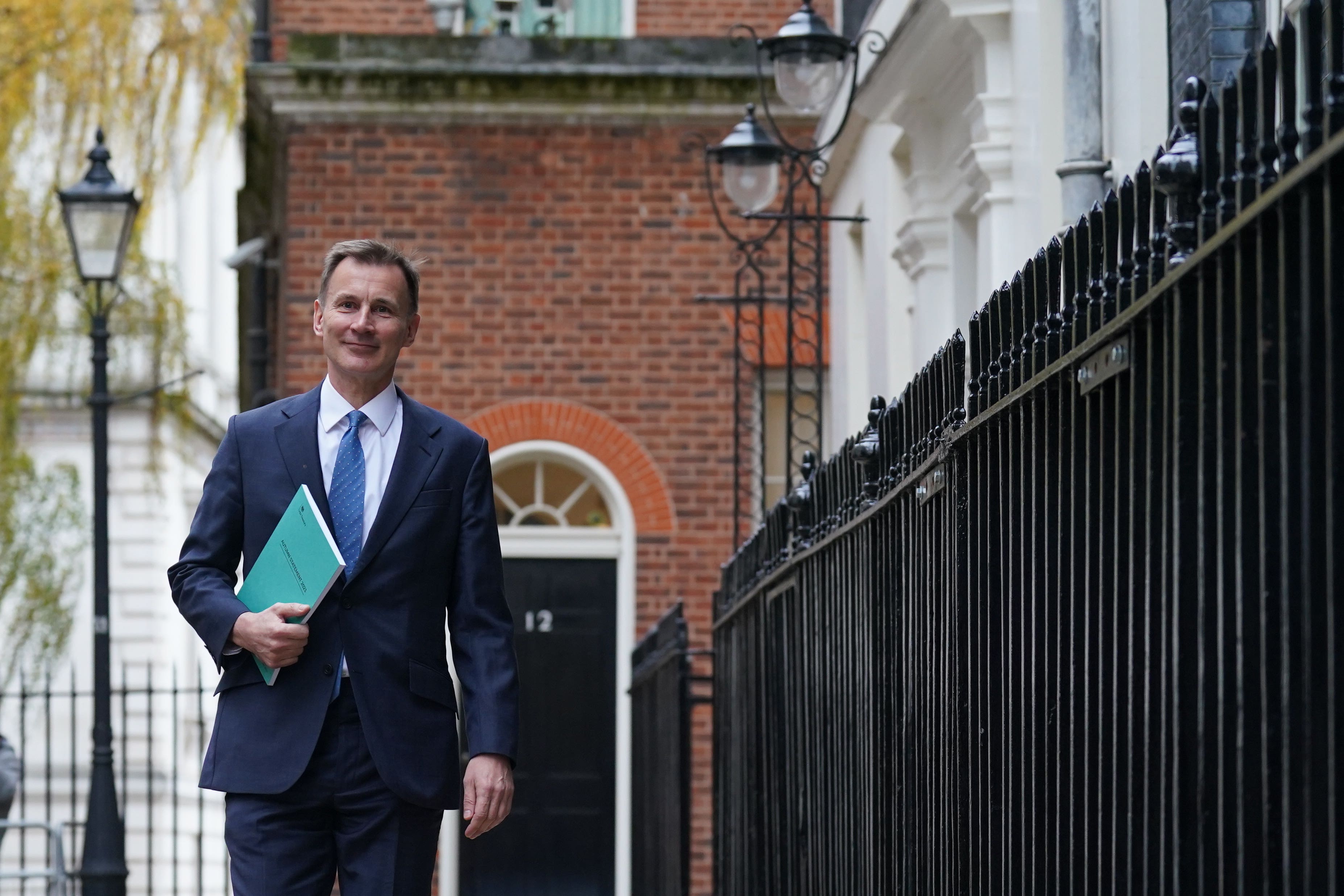 Chancellor of the Exchequer Jeremy Hunt leaves 11 Downing Street to deliver his autumn statement