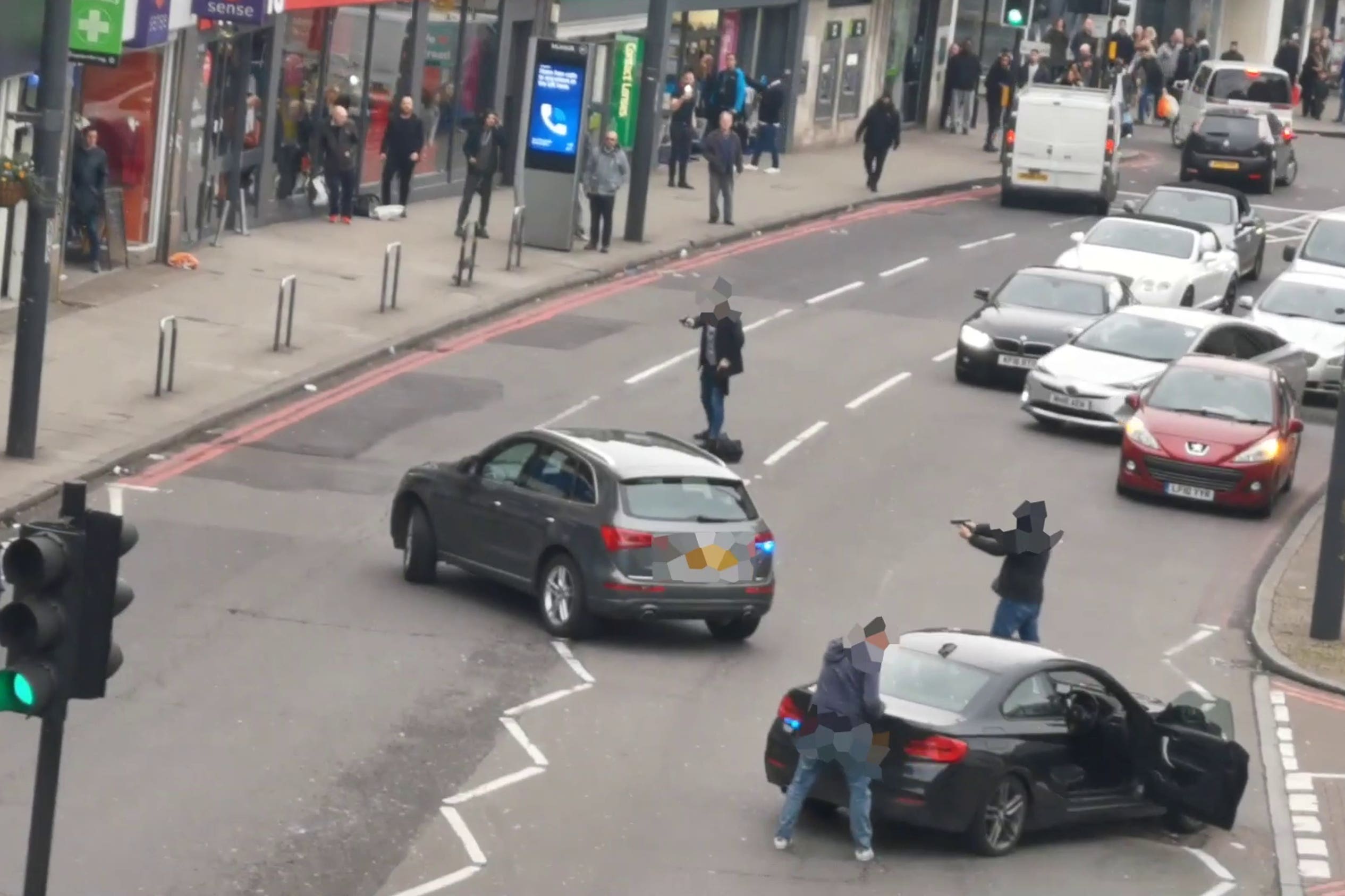 Armed officers approaching Sudesh Amman during the incident (Metropolitan Police/PA)