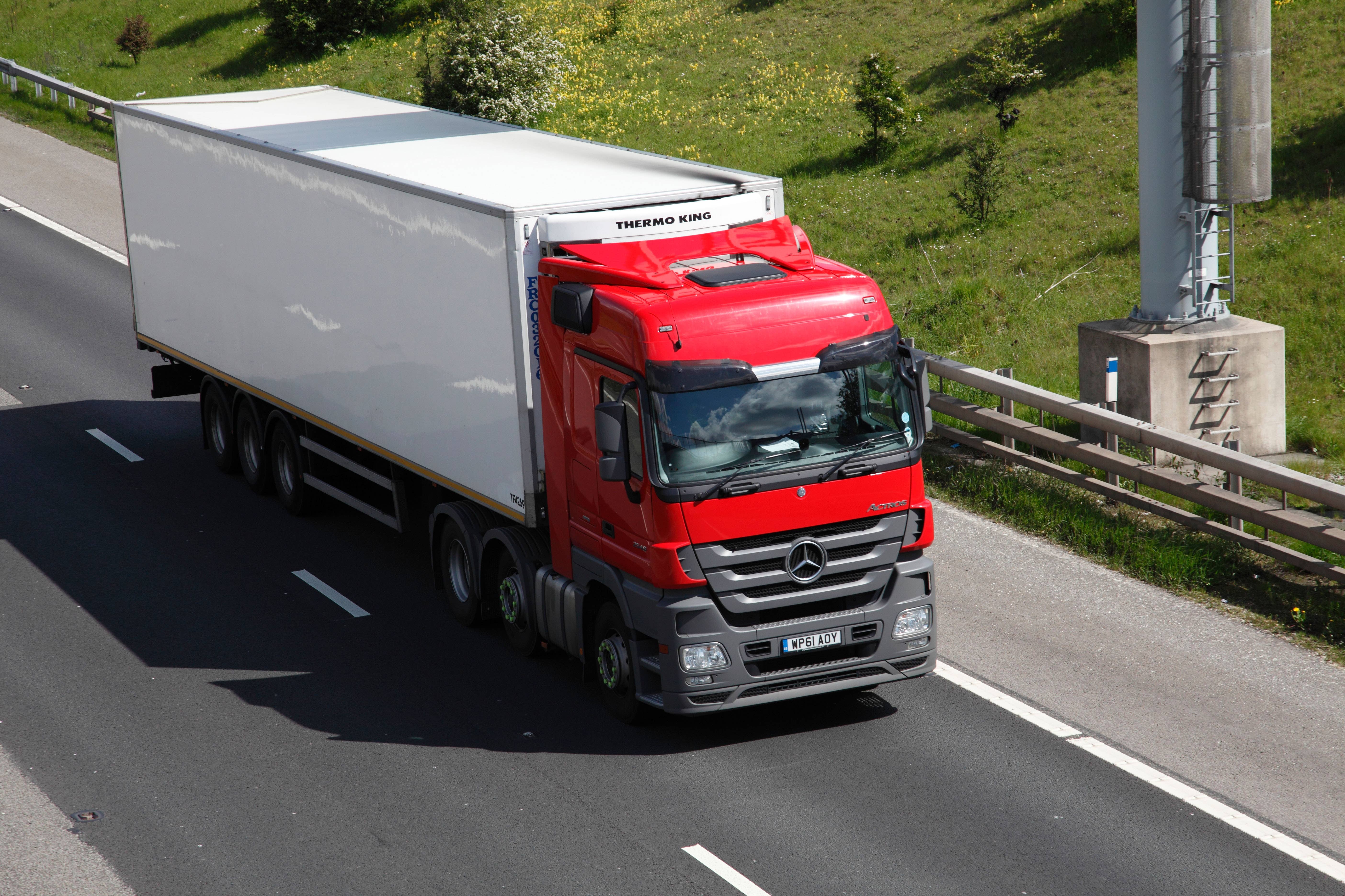 Two taxes on lorries will be frozen to support ‘vital journeys’, the Treasury has announced as part of Chancellor Jeremy Hunt’s autumn statement (Alamy/PA)