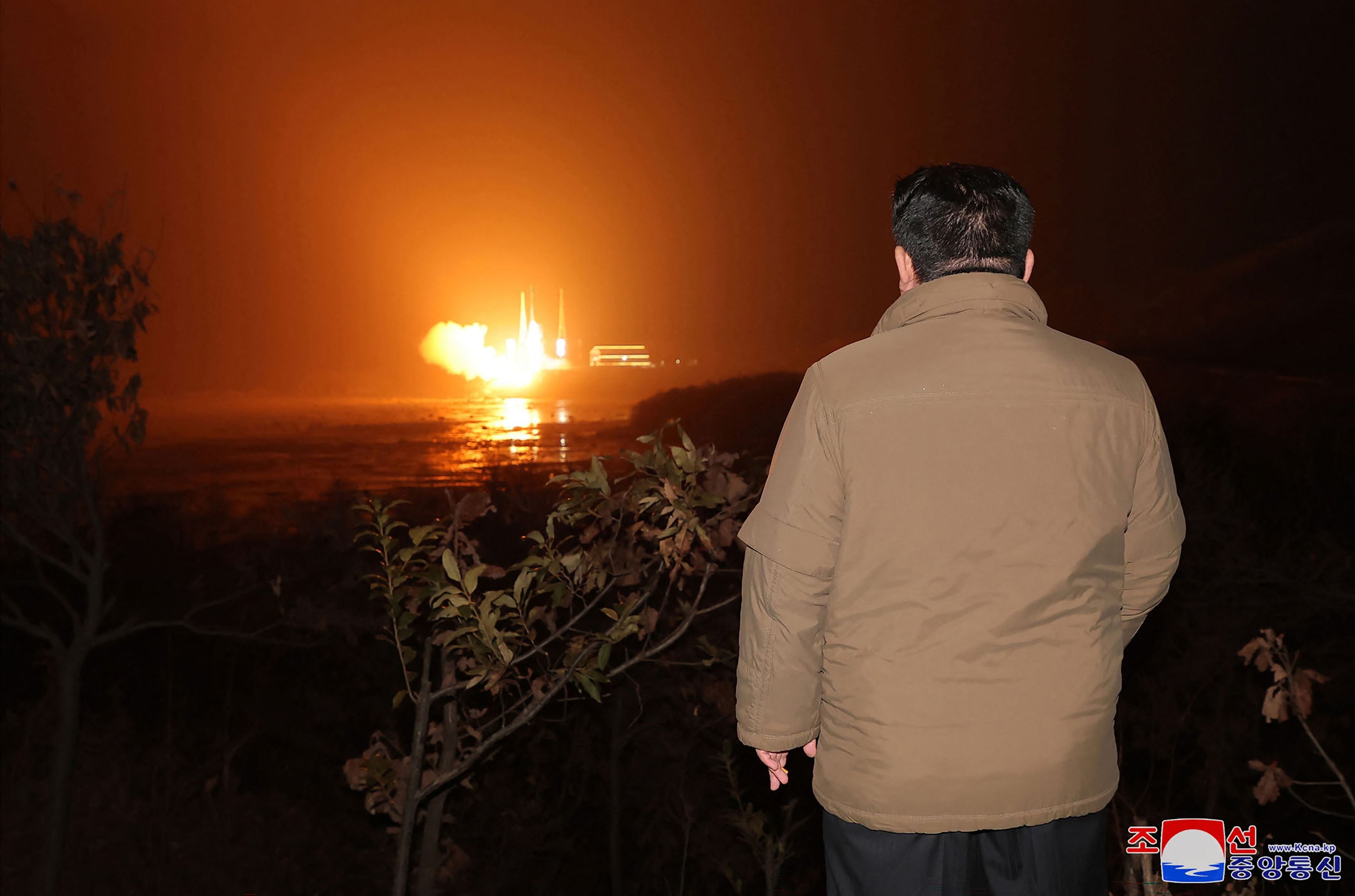 North Korea's leader Kim Jong-un inspecting the launch of a rocket carrying the reconnaissance satellite 'Malligyong-1' from the Sohae Satellite Launch Site in North Phyongan province on 22 November