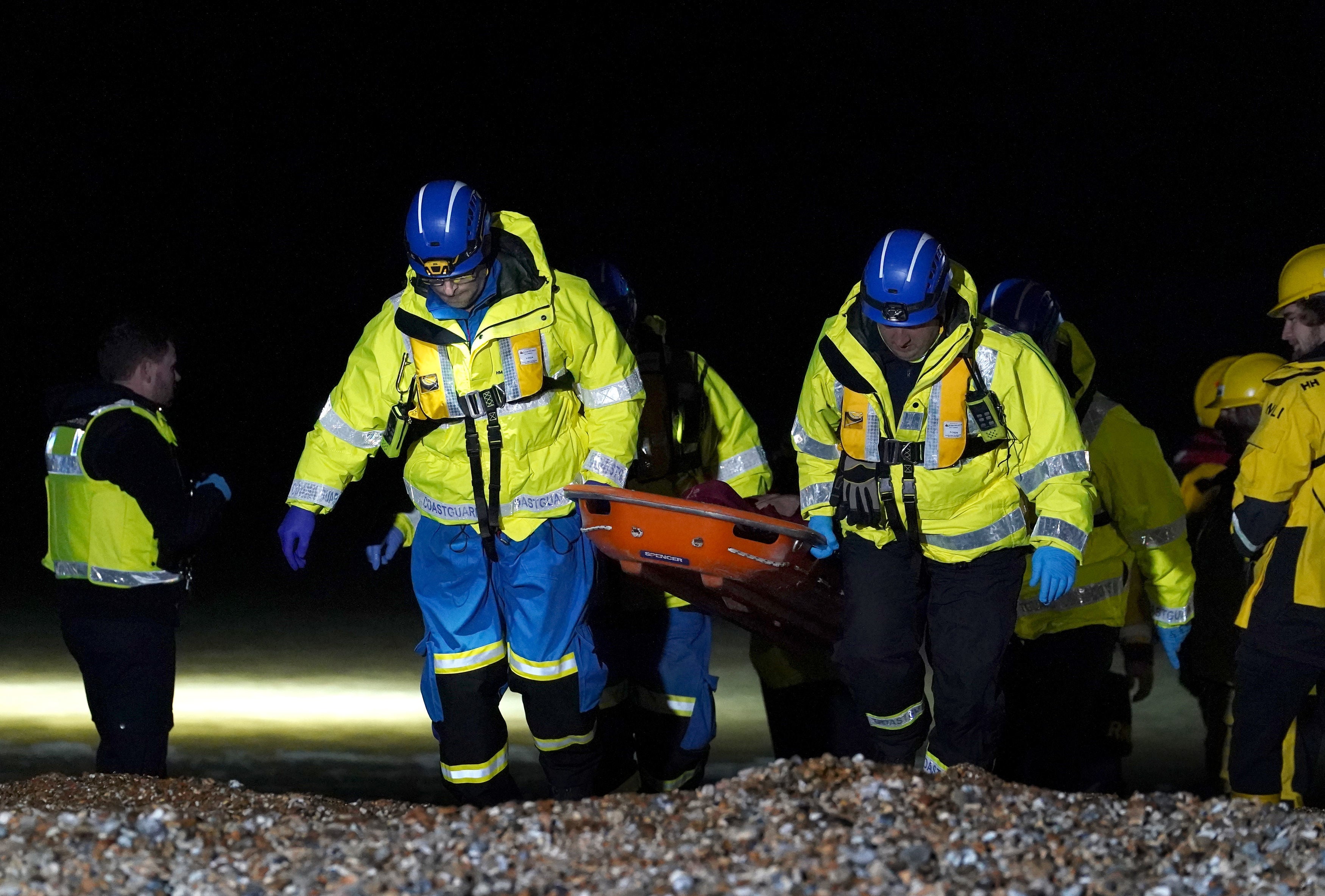 A group of people thought to be migrants are brought in to Dungeness, Kent